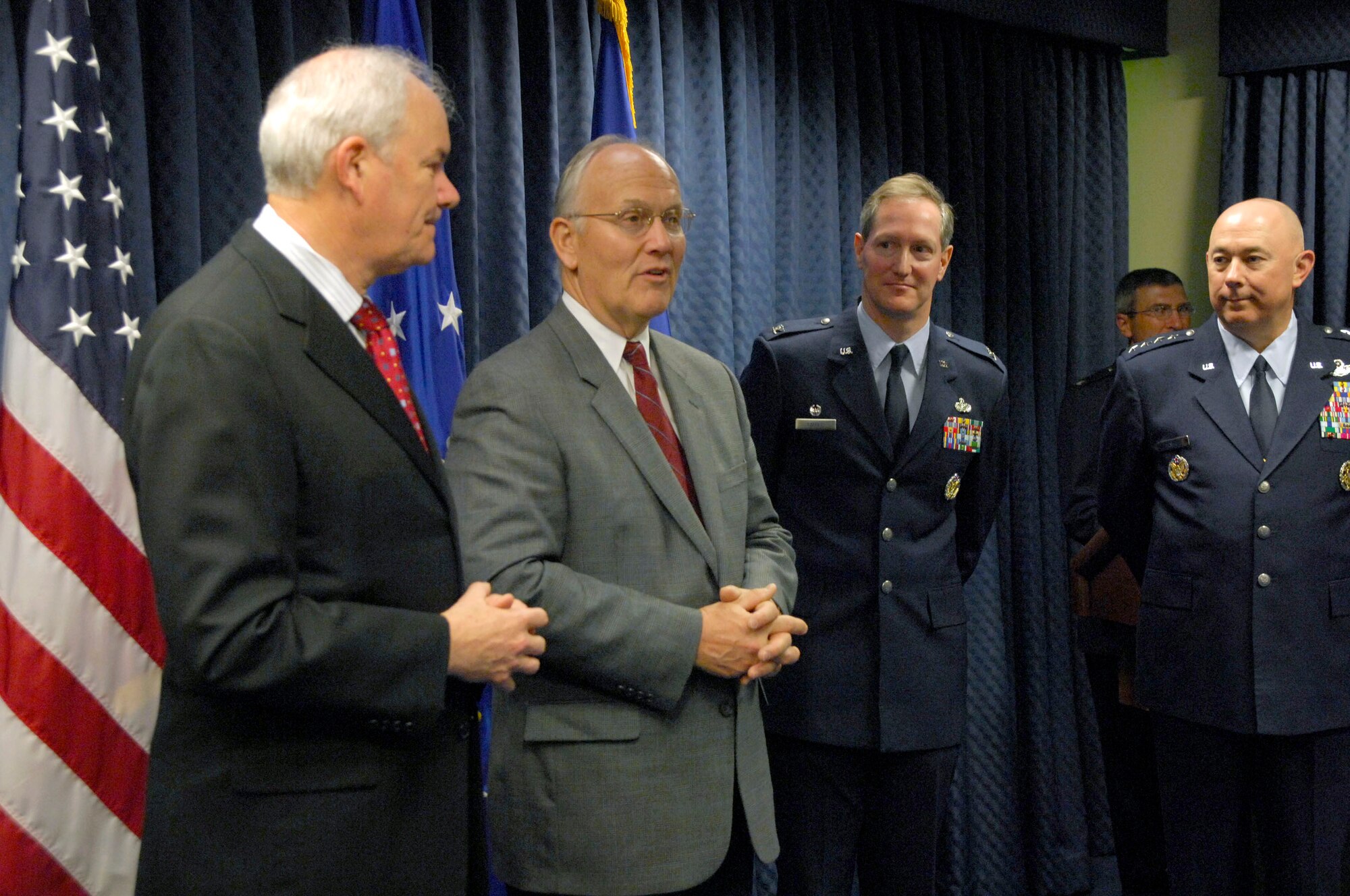 Secretary of the Air Force Michael Wynne, Idaho senator Larry Craig, 366th Mission Support Group commander Col.Tom Laffey and Air Force Chief of Staff T. Michael Moseley gather for opening remarks May 3 prior to the presentation of the 2007 Installation Excellence Award to Mountain Home AFB, Idaho at the Pentagon in Washington, D.C. Standing out among the many great improvements made on the base was their robust energy program where they installed new boilers in multiple facilities, reducing heating costs by $1.2 million and later renegotiated natural gas rates, which slashed costs 24 percent, which in trn saved the base $800,000. (U.S. Air Force photo/Tech. Sgt. Cohen A. Young) 