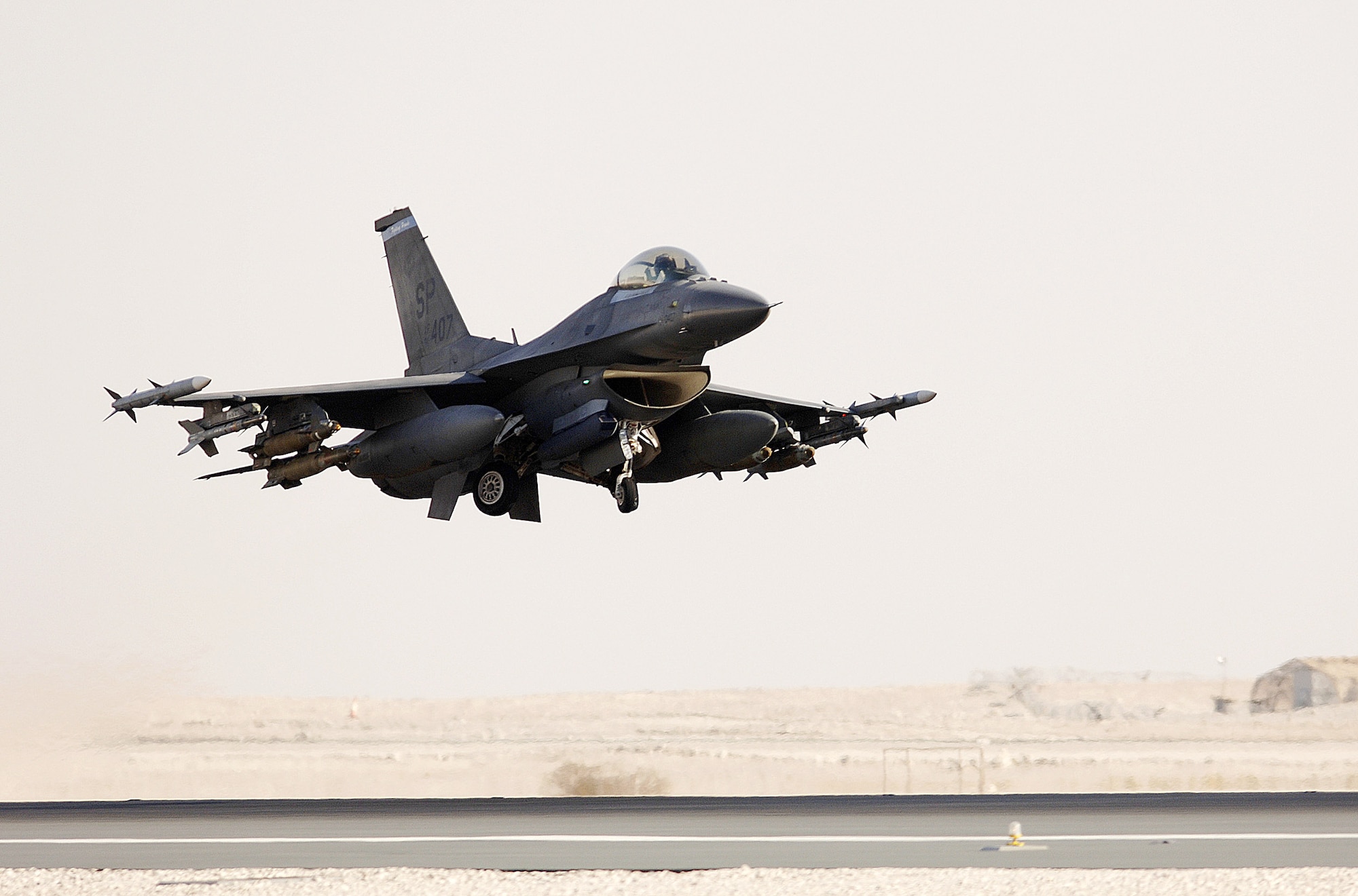 An F-16 Fighting Falcon takes off from a base in Iraq recently to perform a close-air-support mission for coalition ground forces. Combined Forces Air Component aircraft like the F-16 flew 48 close-air-support missions May 3, primarily in northern Iraq, and responded to coalition ground forces in contact with enemy personnel.  (U.S. Air Force photo)