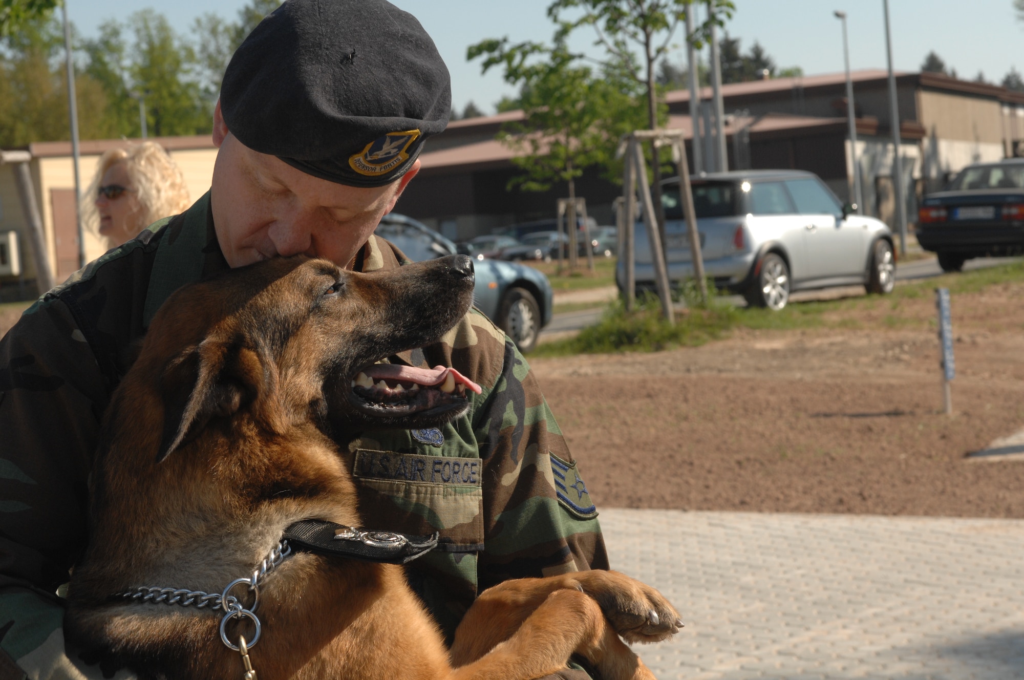 Staff Sgt. Robert Prim, 52nd Security Forces Squadron military working dog handler, and his male working dog, Judy, attended the opening of Spangdahlem’s new veterinarian clinic April 27. Photo by Airman 1st Class Stephanie Clark.