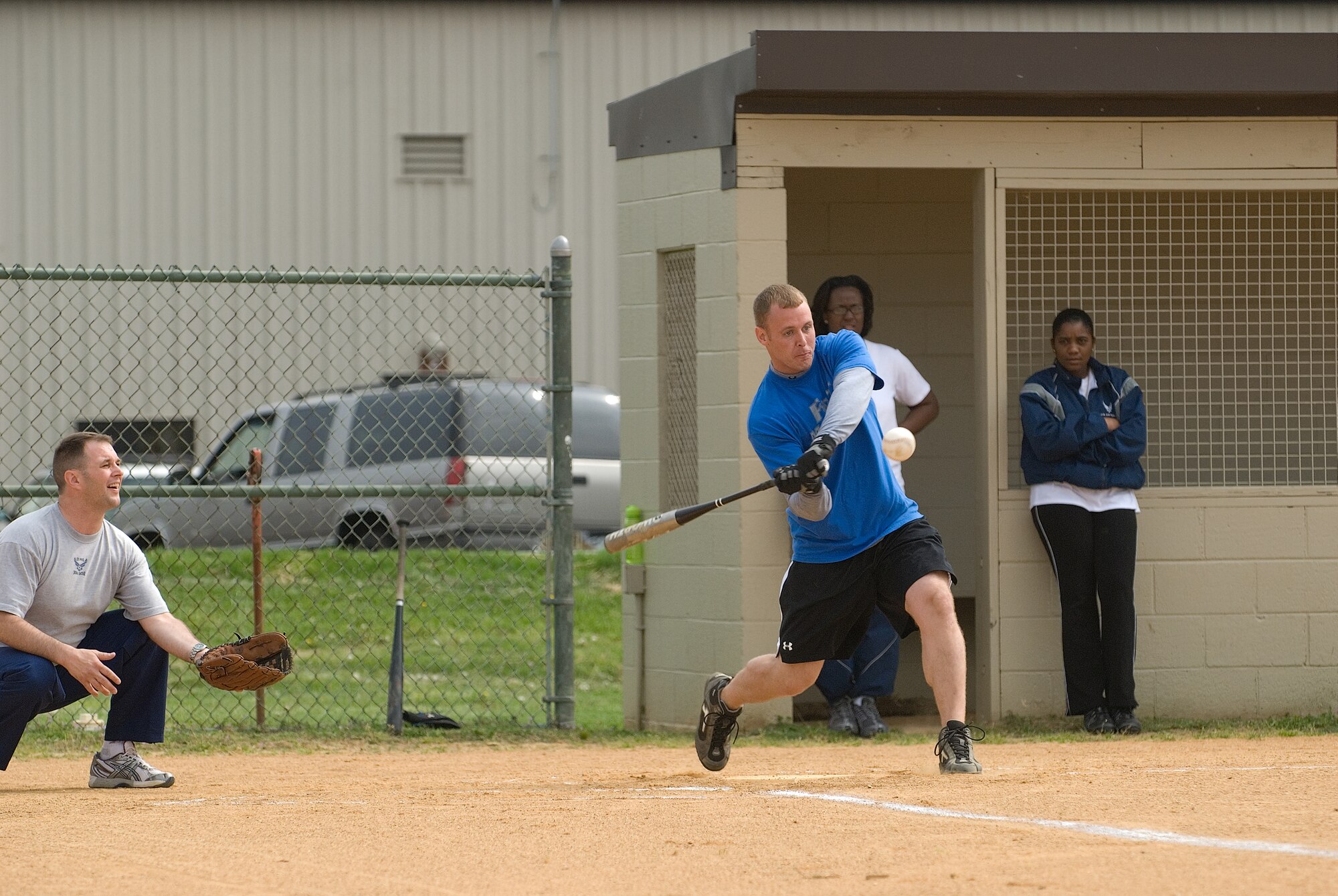 DOVER AIR FORCE BASE, Del. -- Staff Sgt. Joseph Kernan, 436th Communications Squadron, crushes a hit during Wednesday’s softball tournament versus the 436th CES. Dover held a Wing Sports Day sponsored by the Company Grade Officers Council and the 436th Security Forces Squadron. Squadrons on base competed against each other to build camaraderie and take home the first-place trophy.  Despite everyone's best efforts, the 436th Medical Group took top honors for the second straight time. (U.S. Air Force photo/Roland Balik)