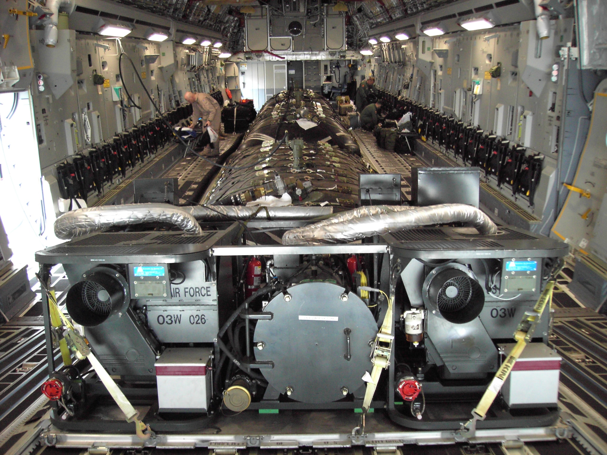 MOUNTAIN HOME AIR FORCE BASE, Idaho -- With the aerial bulk fuel delivery system, or ABFDS, locked down inside the cargo bay of a C-17 aircraft, fuels experts from Mountain Home Langley Air Force Base, Va., helped transport 7,000 gallons of TS-1 Russian jet fuel halfway around the world. Air Force test teams needed the jet fuel to run a series of compatibility tests for the F-22 Raptor. Air Force photo