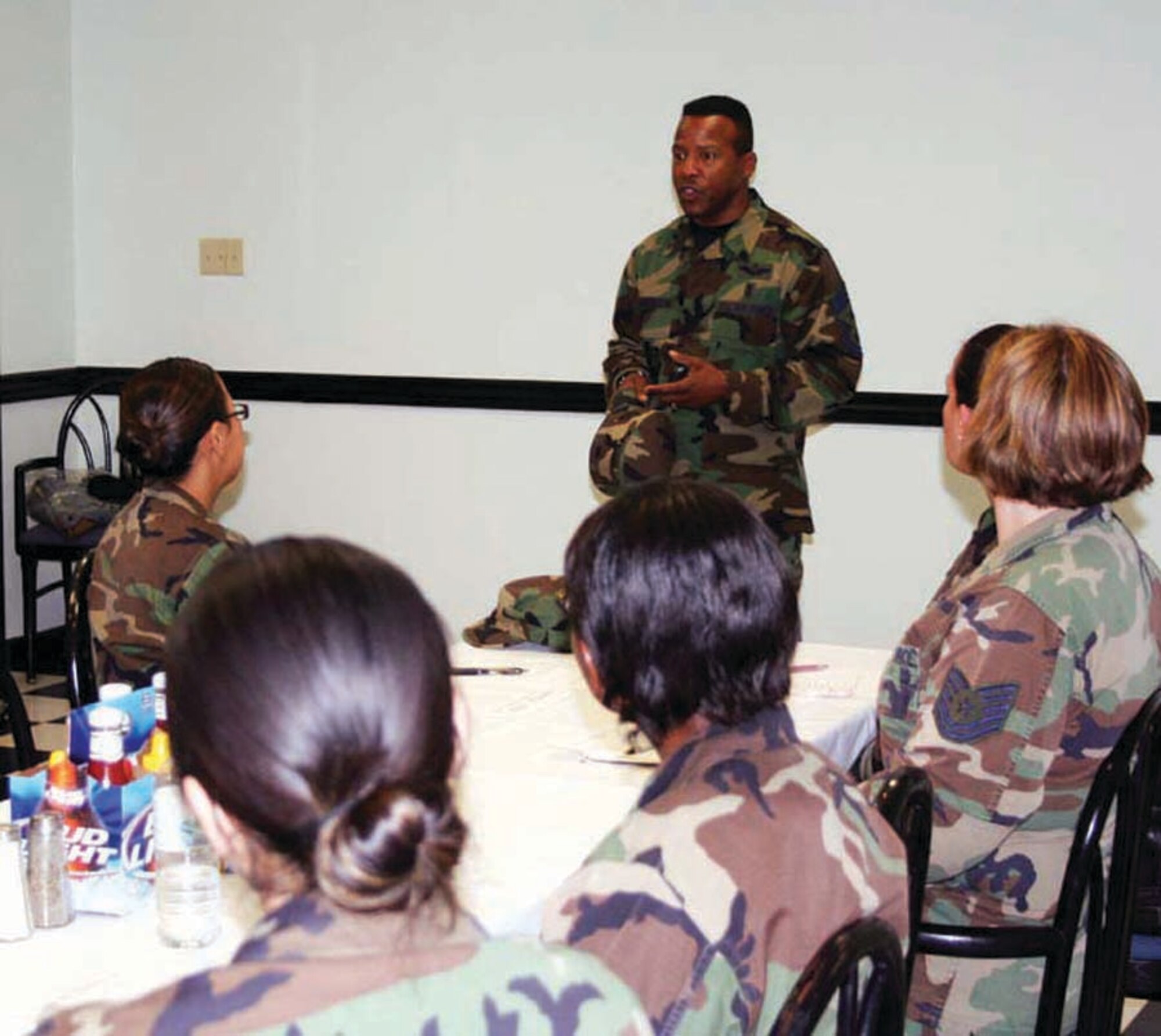 Chief Master Sgt. Jeffrey Richardson, 1st Special Operations Wing command chief, speaks to members of Focus 56 at the April meeting. Focus 56 is a support group for staff and technical sergeants. They offer mentoring, volunteer opportunities, motivation and camaraderie. (U.S. Air Force photo by Jamie Haig)