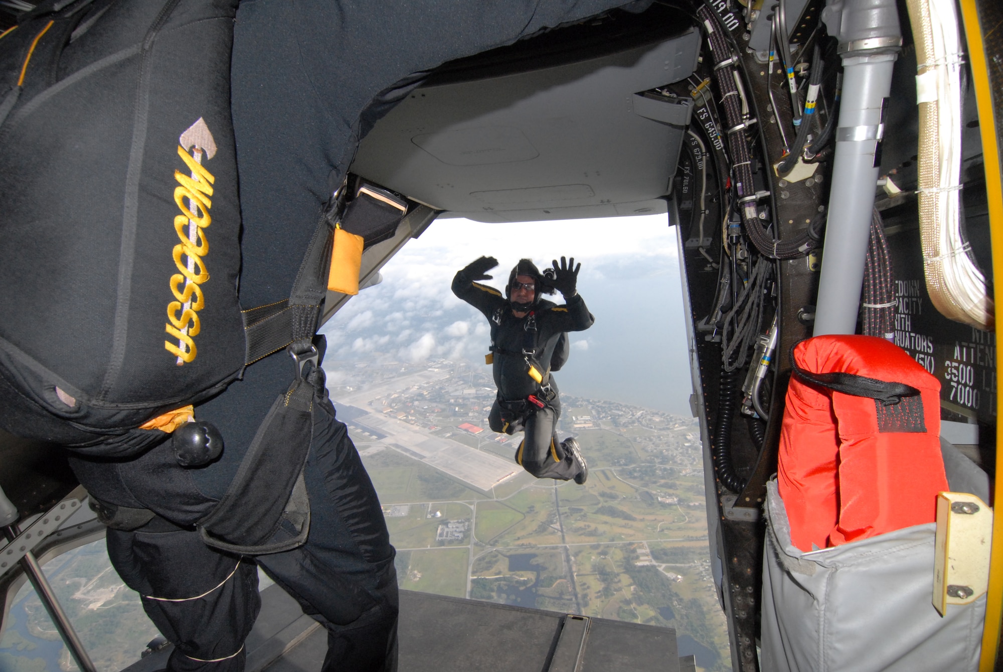 Andy Serano, a member of the U.S. Special Operations Command Parachute Team, jumps from a CV-22 Osprey over MacDill Air Force Base, Fla., April 27.  The Osprey is from Air Force Special Operations Command?s 8th Special Operations Squadron at Hurlburt Field, Fla.  (Department of Defense photo by Mike Bottoms)