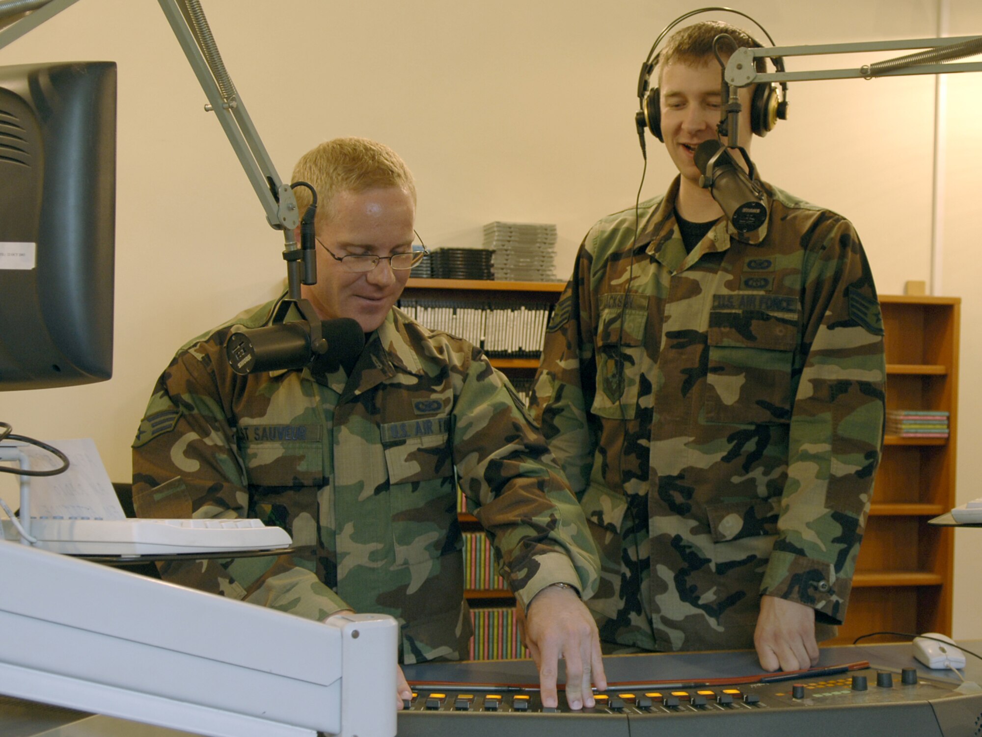 Senior Airman Jeff St. Sauveur  (left) and Staff Sgt. Michael Jackson, Air Force News Service, Det. 7 broadcasters, prepare for a radio show May 4. The duo were the co-hosts of the former Morning Wakeup with Jeff and Mike morning show here that was recently named best morning radio show in all of the Department of Defense.
