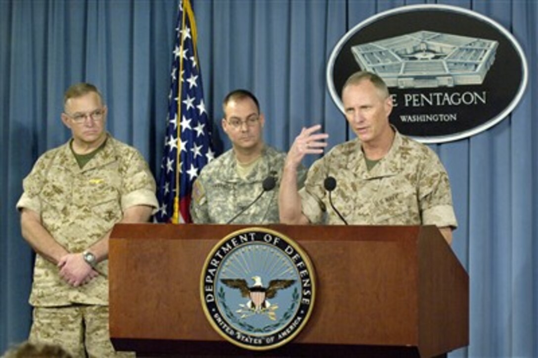 Head Medical Officer of the Marine Corps Rear Adm. Richard Jeffries responds to a reporter's question during a Pentagon press briefing on May 4, 2007, concerning the release of findings from the Mental Health Advisory Team Survey.  The survey assesses the mental health of deployed U.S. Army and Marine Corps personnel in Iraq.  Jeffries was joined by Navy Capt. William P. Nash (left) and Army Col. Carl Castro (center) both contributors to the study.  