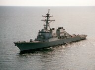 The destroyer USS Cole patrols the Persian Gulf in this recent file photograph. The Cole was the victim Oct. 12 of a terrorist attack in Aden, Yemen. Four sailors are dead, 35 injured and 12 missing in the incident. Photo by Petty Officer 2nd class Gloria Barry, USN.