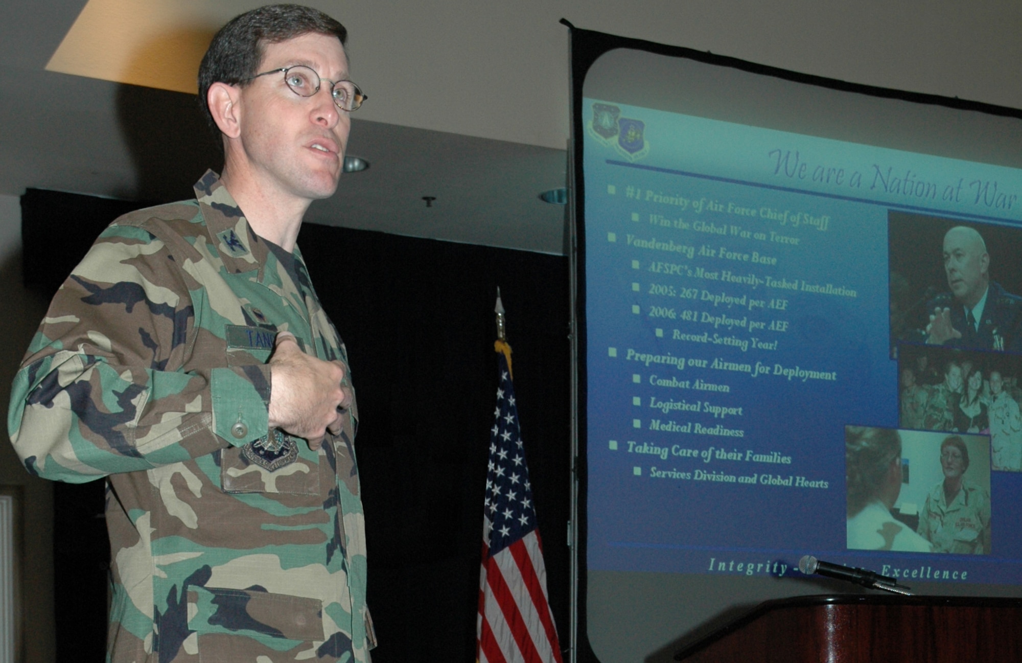 Speaking to nearly 300 small business representatives, Col. Stephen Tanous defines the Air Force's requirements for small business contracts during wartime, and briefs his mission as 30th Space Wing commander during the small business conference at the Pacific Coast Club March 22.  The small business conference "Opportunities Abound" was an outreach to small businesses with or in search of contracts with the base or the Air Force. The conference gave them an opportunity to network, gather information and promote products and services, to benefit from Vandenberg's objective to support small business. (Photo illustration by Senior Airman Stephen Cadette)
