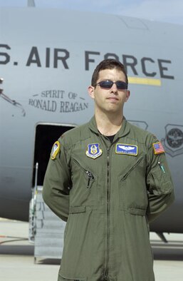 2nd Lt. Charles Conder, from the 729 Airlift Squadron at March Air Reserve Base, stands in front of the “Spirit of Ronald Reagan” C-17.  (U.S. Air Force photo by Staff Sgt. Amy Abbott, 452 AMW/PA)