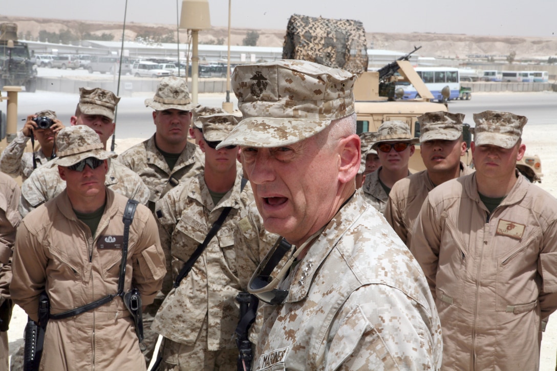 AL ASAD, Iraq - Lt. Gen. James Mattis, the commander of U.S. Marine Corps Forces Central Command, speaks to Marines with Marine Wing Support Group 27, May 6. Mattis explained how things in Iraq have gotten better since the first time Marines came to Iraq.