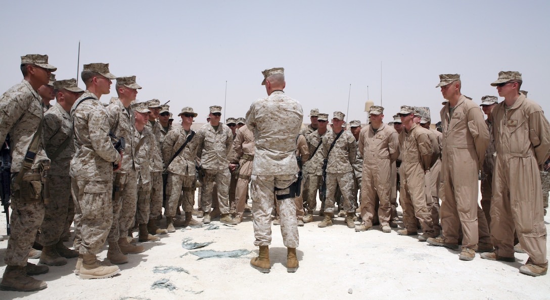 AL ASAD, Iraq - Lt. Gen. James Mattis, the commander of U.S. Marine Corps Forces Central Command, talks to Marines from Marine Wing Support Group 27, May 6. Mattis spoke to members of Marine Wing Support Squadron 271's Incident Response Platoon and 2nd Low Altitude Air Defense Battalion and told them how their work impacted the Marine Corps' mission in Iraq.