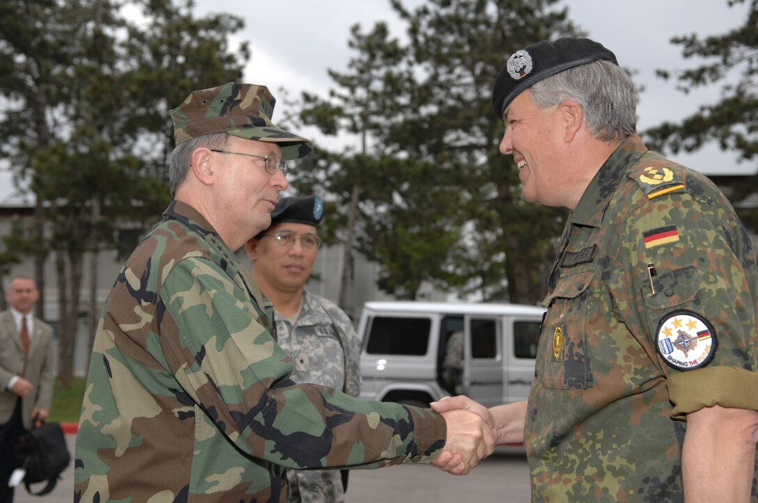 U.S. Navy Adm. Edmund P. Giambastiani, vice chairman of the Joint Chiefs of Staff, shakes hands with German Lt. Gen. Roland Kather, commander of Kosovo Forces, at the KFOR headquarters in Film City, Kosovo, May 4, 2007. Giambastiani received an update on operations in Kosovo and met with troops at Camp Bondsteel. 