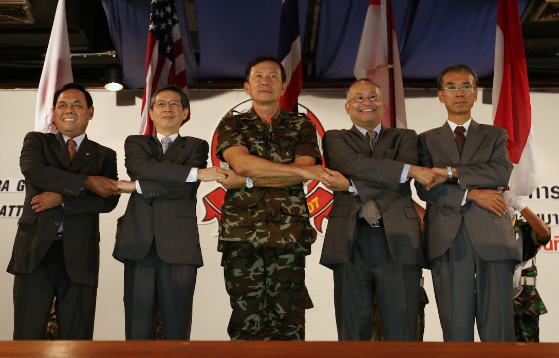 The official party for the combined military exercise "Cobra Gold, 2007" joined hands in a symbol of unity and brotherhood to start the 26th annual exercise during an opening ceremony at the Ambassador City Hotel, Jomtiem, Thailand, May 8. (From left to right) Indonesian Ambassador Ibrahim Yusuf,  Singaporean Ambassador Peter Chan Jer Hing, Thailand Supreme Commander General Boonsrang Niumpradit, U.S. Deputy Chief of Mission Alexander A. Arvizu, and Japanese Ambassador Hideaki Kobayashi.