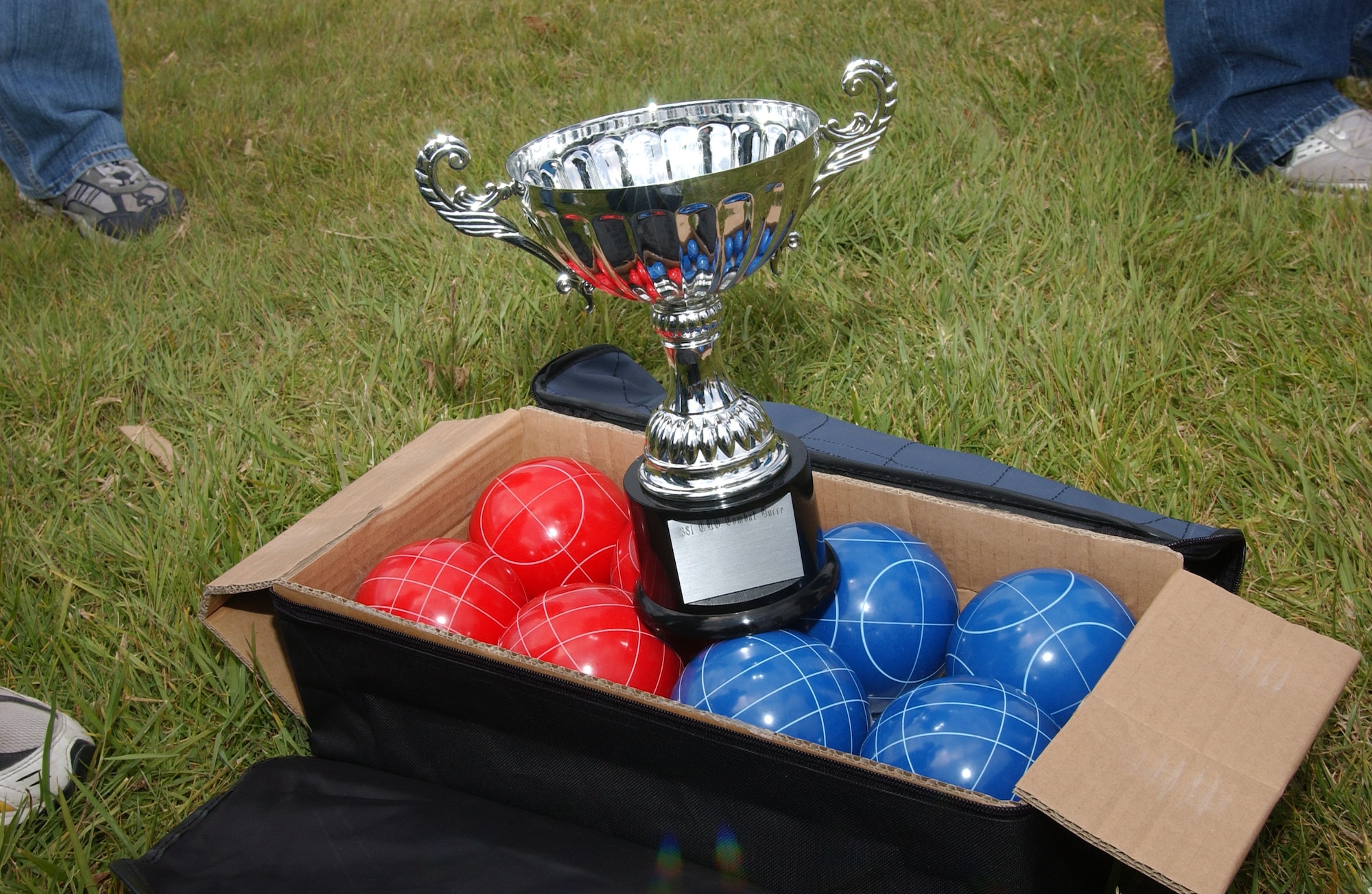 The Combat Bocce Ball Tournament  champions, the Bullys, receive a 1st place trophy and each player their own bocce ball set during the tournament here May 4. The event was put on as one of the 381st TRG quarterly events to ensure morale stays high. (U.S. Air Force Photo by Nichelle Griffiths)