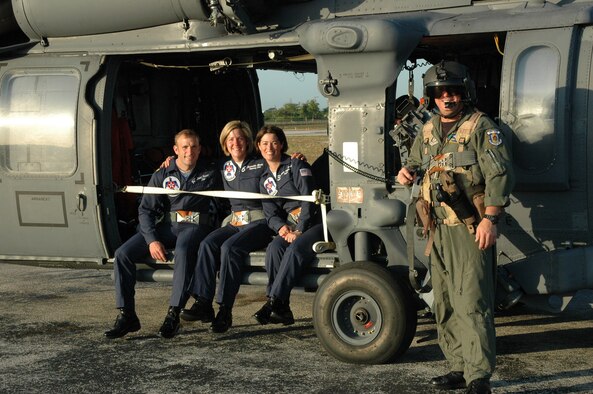 Senior Master Steven Schwarz, 301st Rescue Squadron flight engineer, harnassed five Thunderbird pilots into an HH-60G Pave Hawk who he and his crewmen flew prior to the 13th annual Florida Air & Sea Show to help them avoid traffic delays getting to their aircraft which were in parked at an airport in Miami.  The Rescue Wing Airmen were there to perform a combat search and rescue demonstration in the air show.  