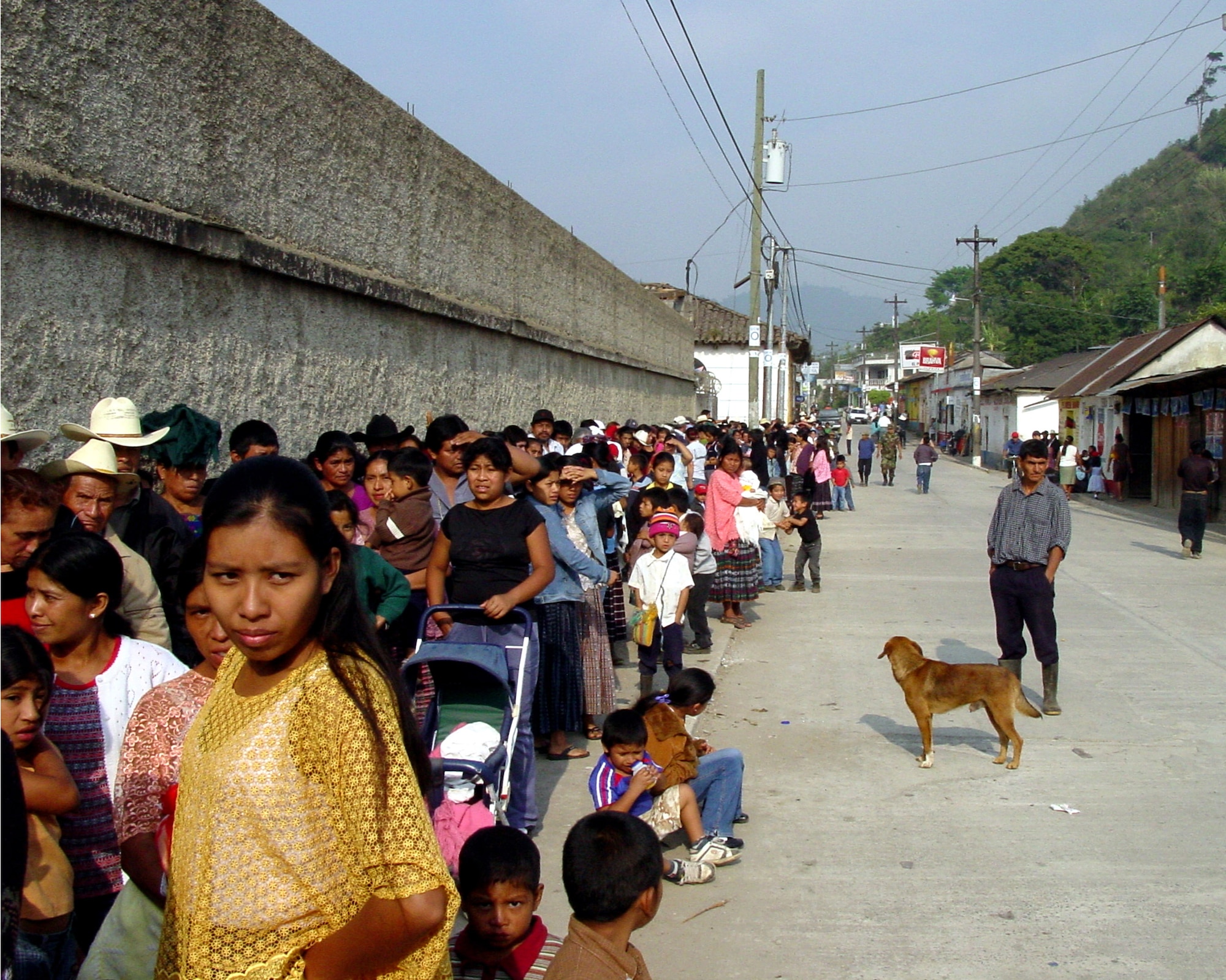 Guatemalan citizens line up around the block to receive some much needed medical attention. Thirteen medical professionals from Air Force Space Command bases saw more than 8,000 Guatemalan patients during a 10-day humanitarian mission. Most of the patients stood in line for more than 12 hours, awaiting much needed medical care. (U.S. Air Force photo)                         