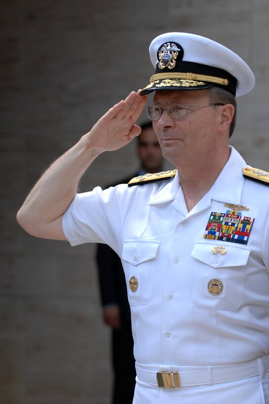 Navy Adm. Edmund P. Giambastiani, vice chairman of the Joint Chiefs of Staff, salutes during the playing of "The Star-Spangled Banner" at the North Africa American Cemetery in Carthage, Tunisia, May 5, 2007.