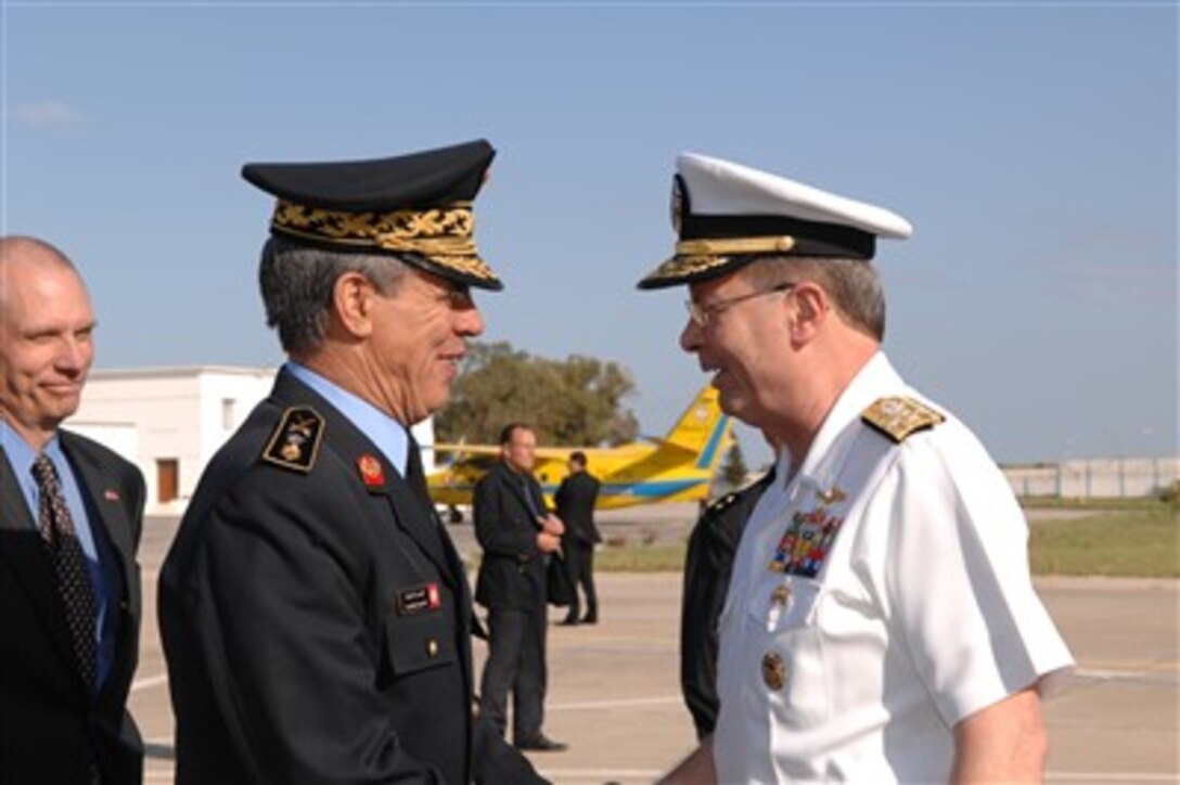 U.S. Navy Adm. Edmund P. Giambastiani, vice chairman of the Joint Chiefs of Staff, meets Tunisian Rear Adm. Tarak EL Arbi, Tunisian Navy Chief of Staff, at the Carthage Aiport in Tunis, Tunisia, May 4, 2007.
