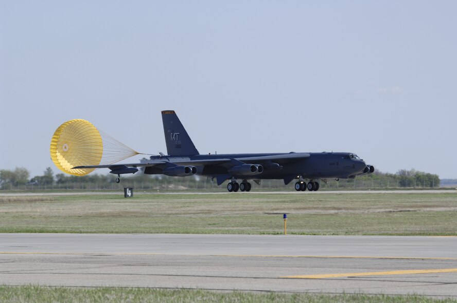 MINOT AIR FORCE BASE, N.D. – The drag chute of a B-52H Stratofortress deploys as Col. Eldon Woodie, 5th Bomb Wing commander, lands here for the last time as an Air Force pilot May 7. A crew member’s ‘fini-flight’ is a cherished Air Force tradition. A command pilot with more than 4,700 hours, Colonel Woodie retires from the Air Force in June after 26 years of service. (U.S. Air Force photo by Senior Airman Christopher Boitz)
