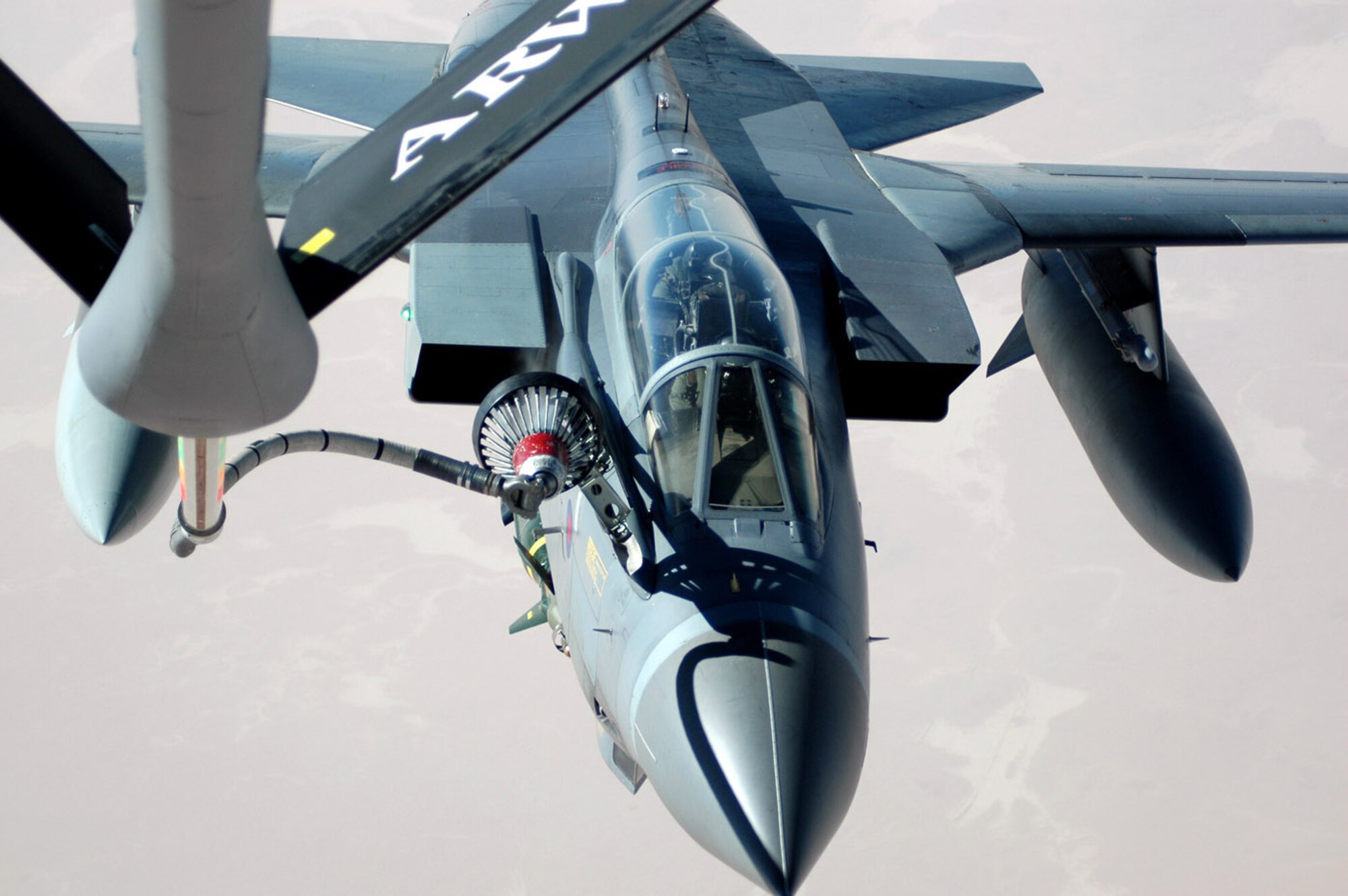 A British Royal Air Force GR4 Tornado takes on fuel May 8 from a KC-135 Stratotanker from the 379th Air Expeditionary Wing during an Operation Iraqi Freedom mission. KC-135 aircrews from the 340th Expeditionary Air Refueling Squadron offload about 1 million pounds of fuel each day to a variety of Air Force, Navy and coalition aircraft.  Aerial refueling allows bomber, fighter and intelligence, surveillance and reconnaissance aircraft to maintain a persistent presence over the battlefield. (U.S. Air Force photo/Senior Airman Erik Hofmeyer) 