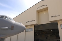 MINOT AIR FORCE BASE, N.D. -- A newly refurbished facility was dedicated the Patterson Maintenance Facility in honor of Lt. Col. David R. Patterson during a dedication ceremony here May 4. Prior to his accidental death Sept. 18, 2004, Colonel Patterson was the 5th Maintenance Group deputy commander. The facility plaque includes the words: “He believed in the 5th Bomb Wing maintainers and marveled at their everyday Herculean efforts.” The $9.2-million multi-use facility is capable of fully housing a B-52H, a critical capability at a base known for its cold-weather temperatures. (U.S. Air Force photo by Airman 1st Class Joe Rivera)