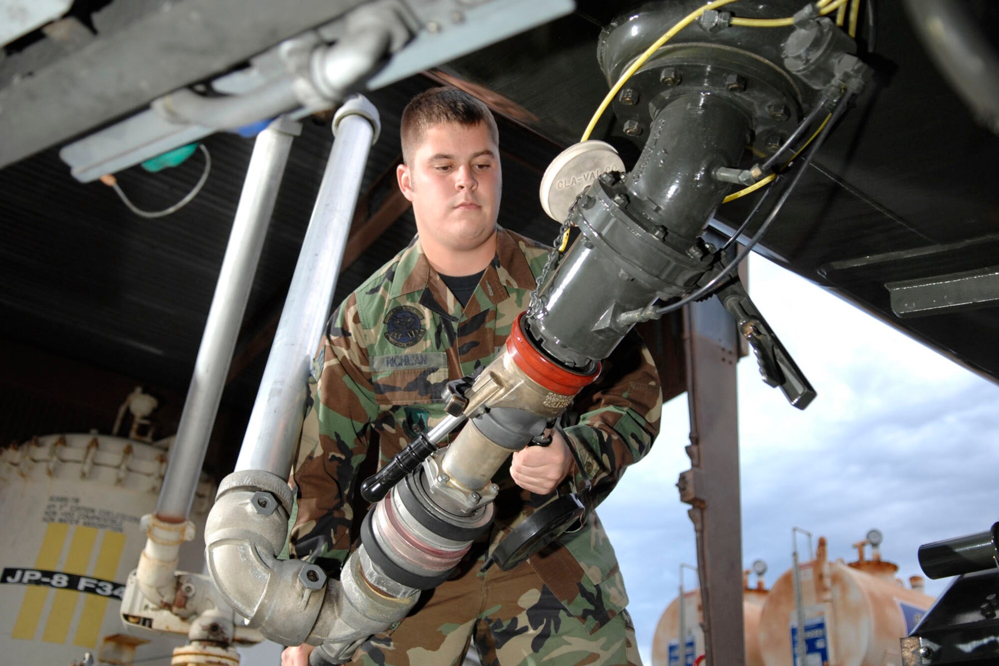 EGLIN AIR FORCE BASE, Fla. -- Senior Airman Justin Richman, 96th Logistics Readiness Squadron fuels specialist, prepares a fueling unit to be filled at the fill stand. Originally from Fort Dodge, Iowa, Airman Richman has been in the Air Force for four years. In his off-duty time, he enjoys spending time with his friends and family. Airman Richman was recently selected as a Sharp Troop by the Eglin Chiefs' Group. (U.S. Air Force photo by Craig McDonnell)