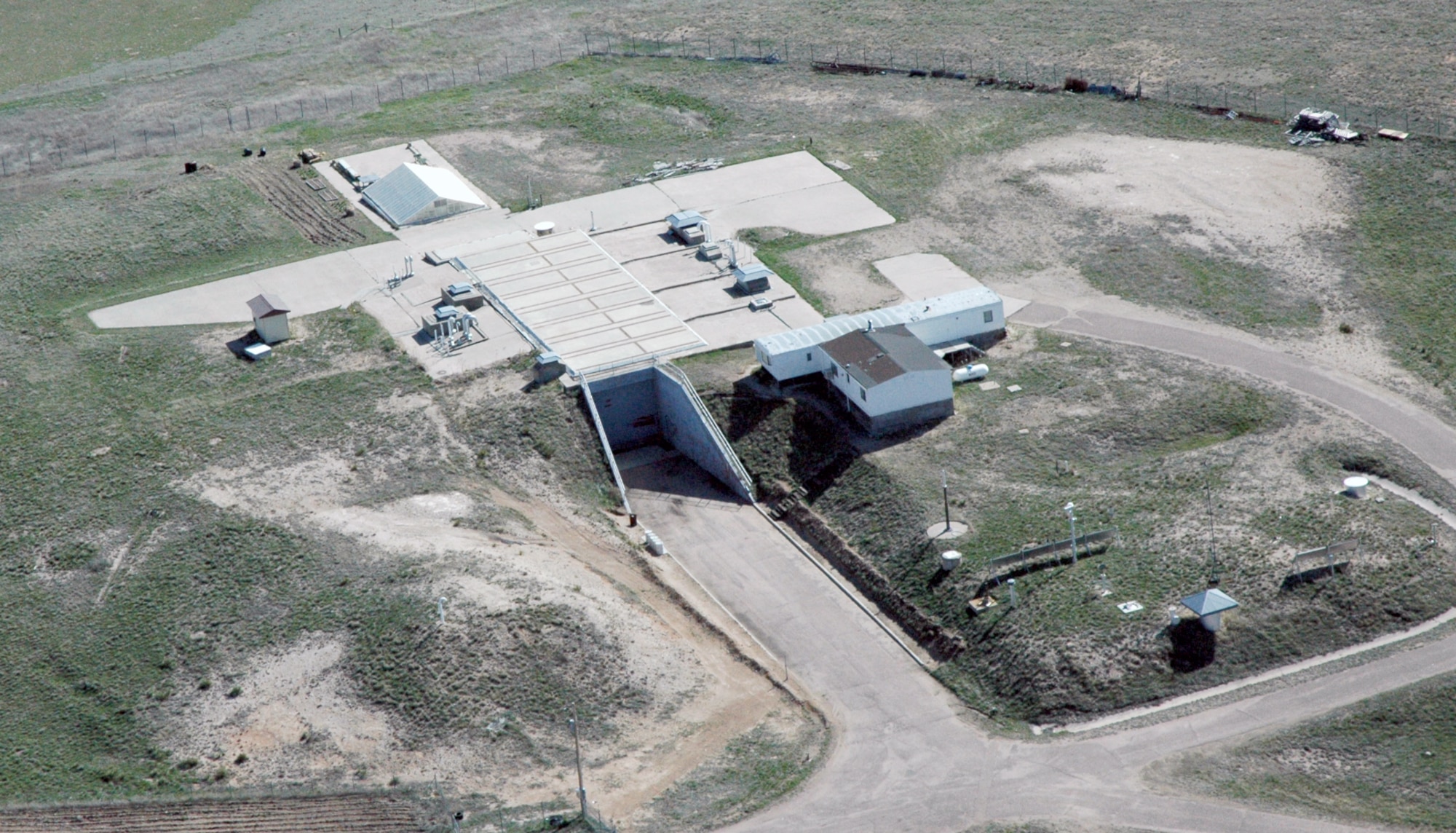 An Atlas E missile site is now home for a couple who bought the property located just outside Kimball, Neb. The large, metal doors that once contained a powerful nuclear missile now contain an RV.