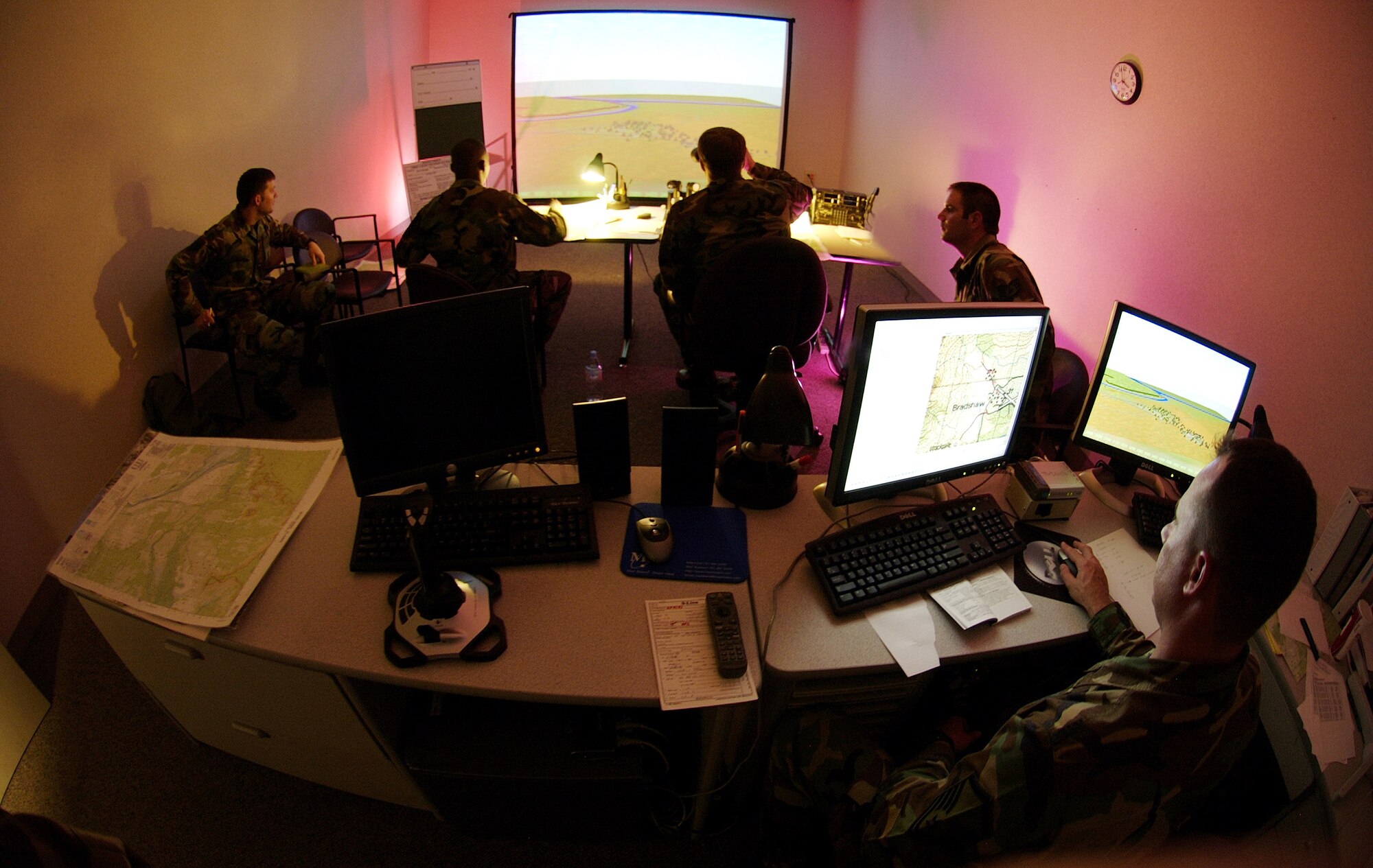 Joint terminal attack controllers receive detailed instruction and training on tactics, techniques and procedures for requesting, coordinating and controlling airpower in tactical operations on the joint battlefield as Master Sgt. Craig Hillsman (foreground), a 6th Combat Training Squadron instructor at Nellis Air Force Base, Nev., observes.  JTACs are recognized throughout the U.S. military as experts in air-to-ground operations.  (U.S. Air Force photo/Master Sgt. Kevin J. Gruenwald)