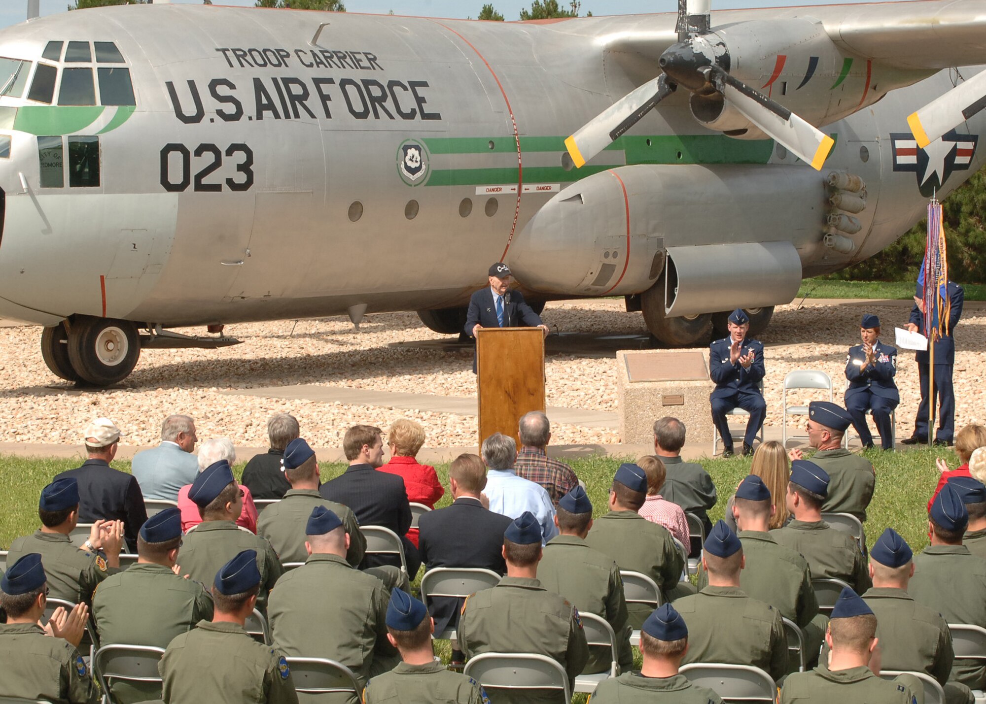 Retired Col. Gail Halvorsen, C-47 and C-54 pilot, speaks at a Berlin Airlift Streamer Ceremony at the air park May 3. During the ceremony, Colonel Halvorsen, who is famous for airdropping candy during Operation Little Vittles, presented the 317th Airlift Group with the streamer on behalf of the SECAF for their work during the Berlin Airlift and today's Global War on Terror.  (U.S. Air Force photo by: Airman 1st Class Felicia Juenke)
