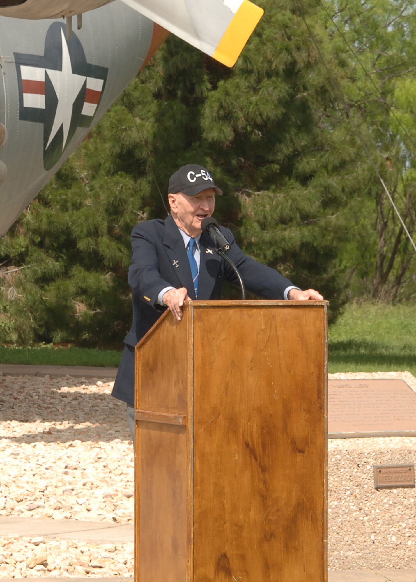 Retired Col. Gail Halvorsen, former C-47 and C-54 pilot from the 317th Troop Carrier Group, speaks at a Berlin Airlift Streamer Ceremony at the air park here May 3. During the ceremony, Colonel Halvorsen, who is famous for airdropping candy during Operation Little Vittles in 1948 and 1949, presented the 317th Airlift Group with the streamer on behalf of Congress for their work in the Berlin Airlift and today's Global War on Terror. (U.S. Air Force photo by: Airman 1st Class Felicia Juenke)
