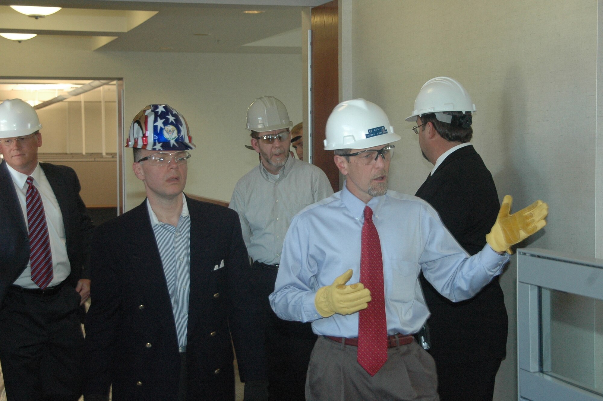 Mr. John Vonglis, Principal Deputy Assistant Secretary of the Air Force for Financial Management, tours the Air Force Financial Services Center May 2 at Ellsworth Air Force Base.  Mr. Vonglis and other key financial managment officials attended a three-day financial management executive session here May 1-3. (U.S. Air Force photo/Tech. Sgt. Todd Wivell)