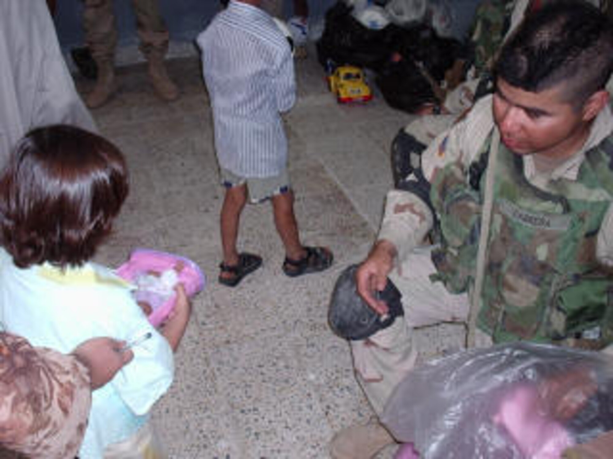 1st Infantry Division Soldiers donate toys to Iraqi Child Organization