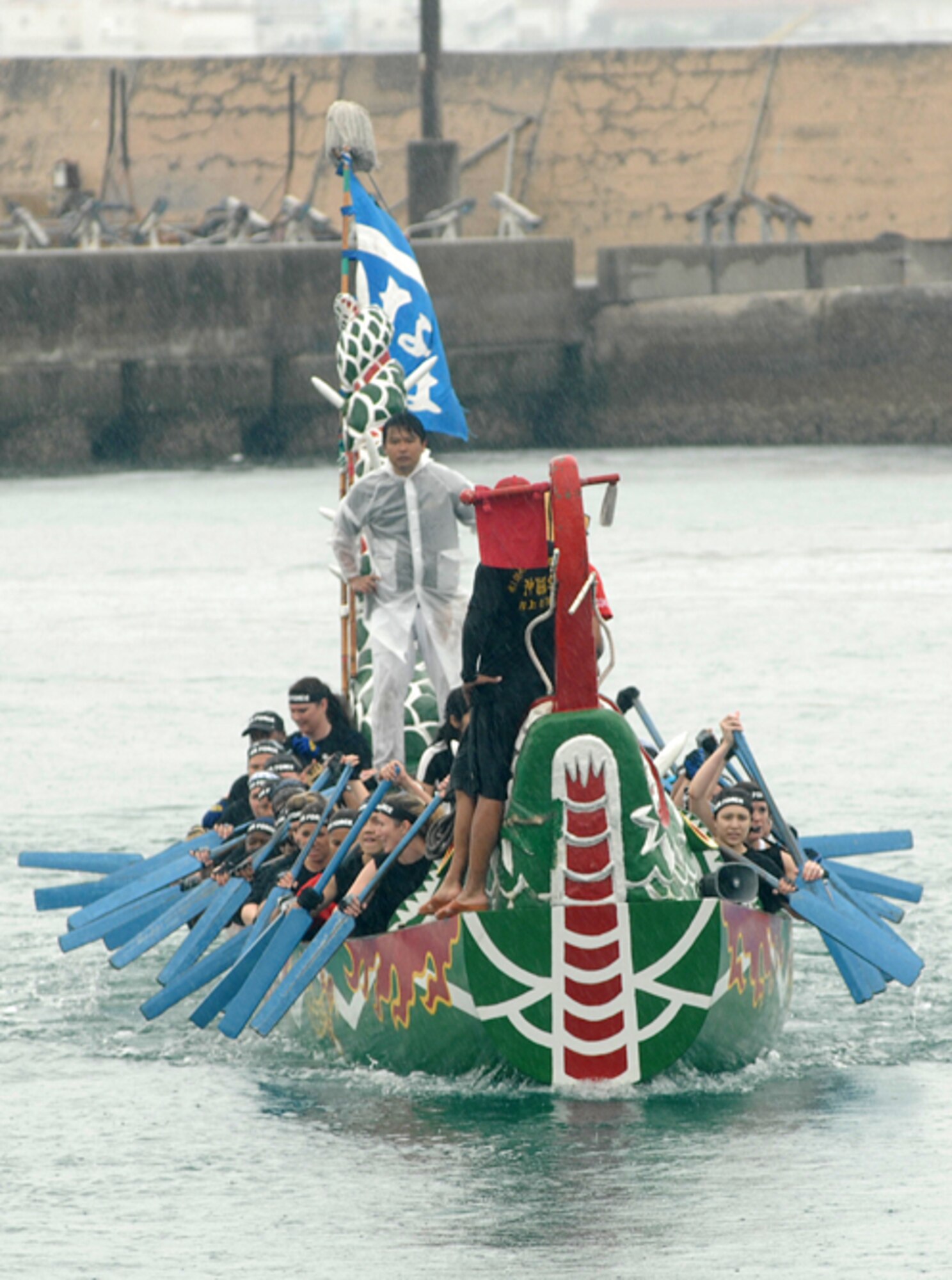 Members of the women’s Dragon Boat team from Kadena Air Base, Japan, synchronize their rowing at the 33rd Annual Naha Dragon Boat Races on May 5. More than 50 teams, including eight military teams from U.S. bases on Okinawa, took part in the annual competition. The women’s team won their heat and took second place overall in the U.S. military forces women’s bracket. (U.S. Air Force/Airman 1st Class Kasey Zickmund)