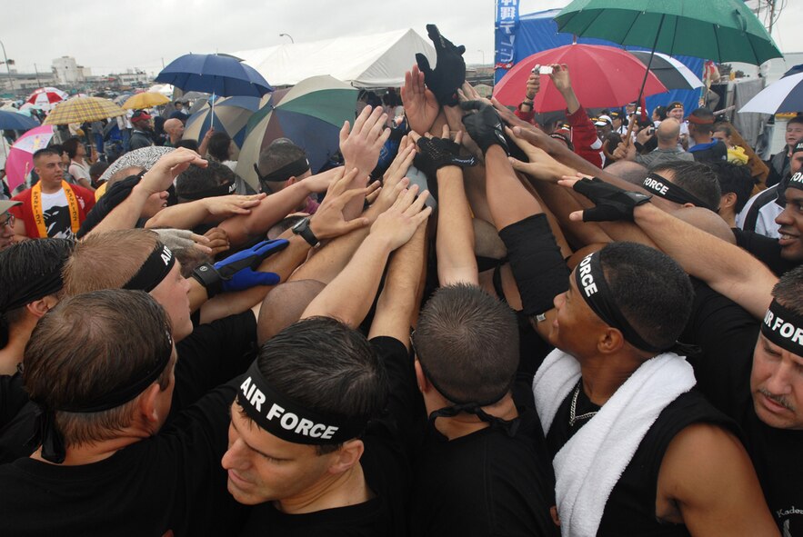 The Kadena men’s team brings all hands in to get motivated before their race. The men’s team placed third in their race and took second place overall in the U.S. military forces men’s bracket. The Kadena “Shoguns” dragon boat teams competed in the 33rd Annual Naha Dragon Boat races at Naha Port May 5. More than 50 teams, including eight military teams from U.S. bases on Okinawa, took part in the annual competition. Among the U.S. military teams, the Air Force finished second at 5:00.22 minutes in the men’s division. (U.S. Air Force/Airman 1st Class Kasey Zickmund)