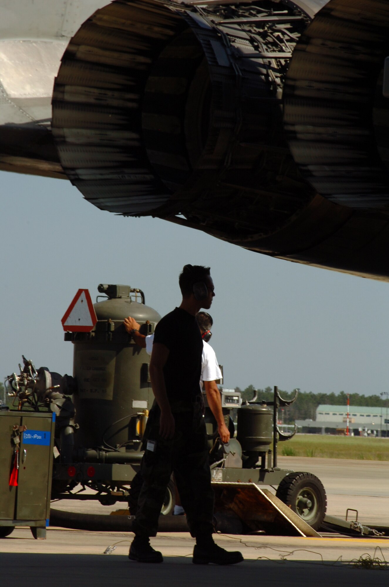 Staff Sgt. Andrew Parker, 33d Aircraft Maintenance Squadron crew chief, supervises the refueling operation of an F-15C at Eglin Air Force Base, Fla. The 33d Fighter Wing is conducting surge operations May 8-10, averaging more than 80 sorties a day. Surge operations test maintainers' abilities to generate more sorties than normal and give pilots an increased number of flying hours in a condensed time period.