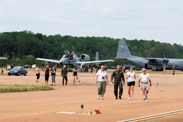 Blaze Team members explore the static displays on the SAC ramp Saturday during Career Day. A B-2 flyby and A-10 demonstration were also part of the festivites. (U.S. Air Force Photo by Kenn Brown)