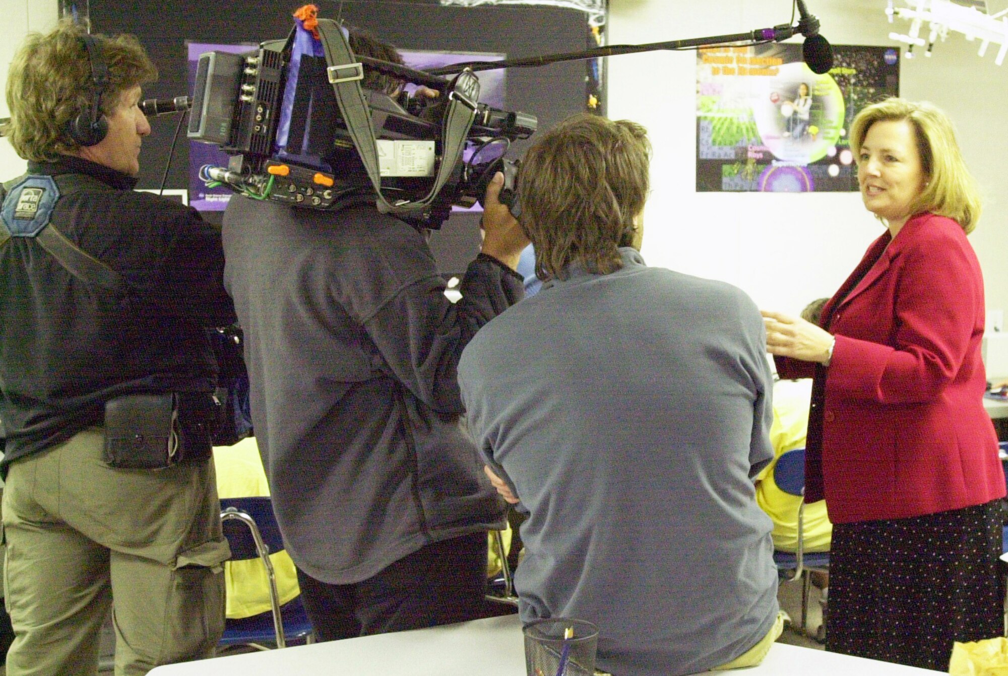 Ronda Cole, director of the Starbase La Luz Academy, part of the Air Force Research Laboratory?s education outreach program here, is interviewed by a Canadian television production team.  Discussing some of the lab?s space-related student programs, Ms. Cole was one of several people who were interviewed for a documentary called ?The Space Innovations? that is slated to air on the Canadian Broadcasting Company in February.  The firing of a 15,000-watt laser and laser-optical facilities at the Directed Energy Directorate?s Starfire Optical Range were also filmed. U.S. Air Force photo by J. Rich Garcia                               