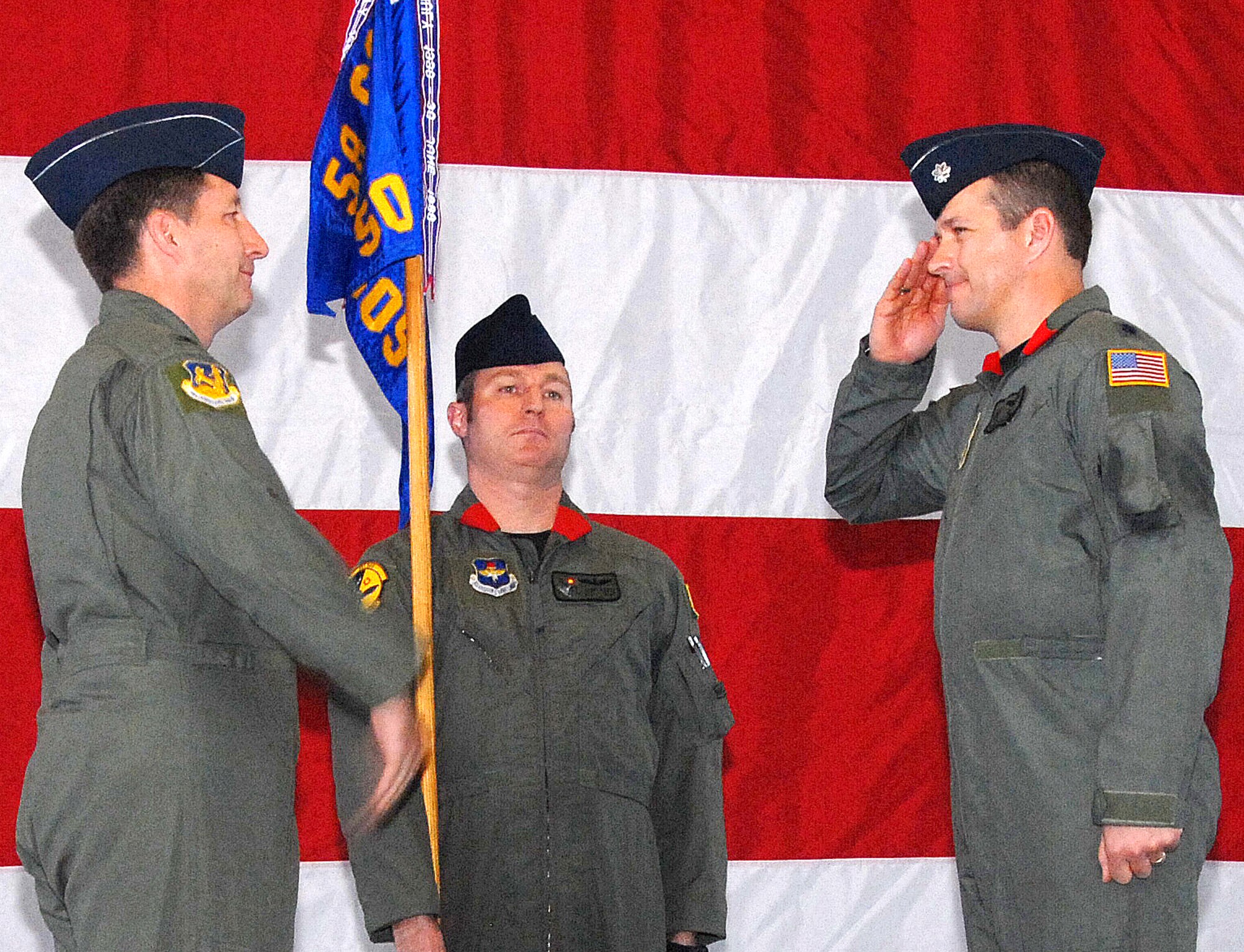 Lt. Col. Todd Lancaster, former 551st Special Operations Squadron commander, salutes after relinquishing command to Col. Leonard Smales, 58th Operations Group commander. U.S. Air Force photo by Staff Sgt. Markus M. Maier