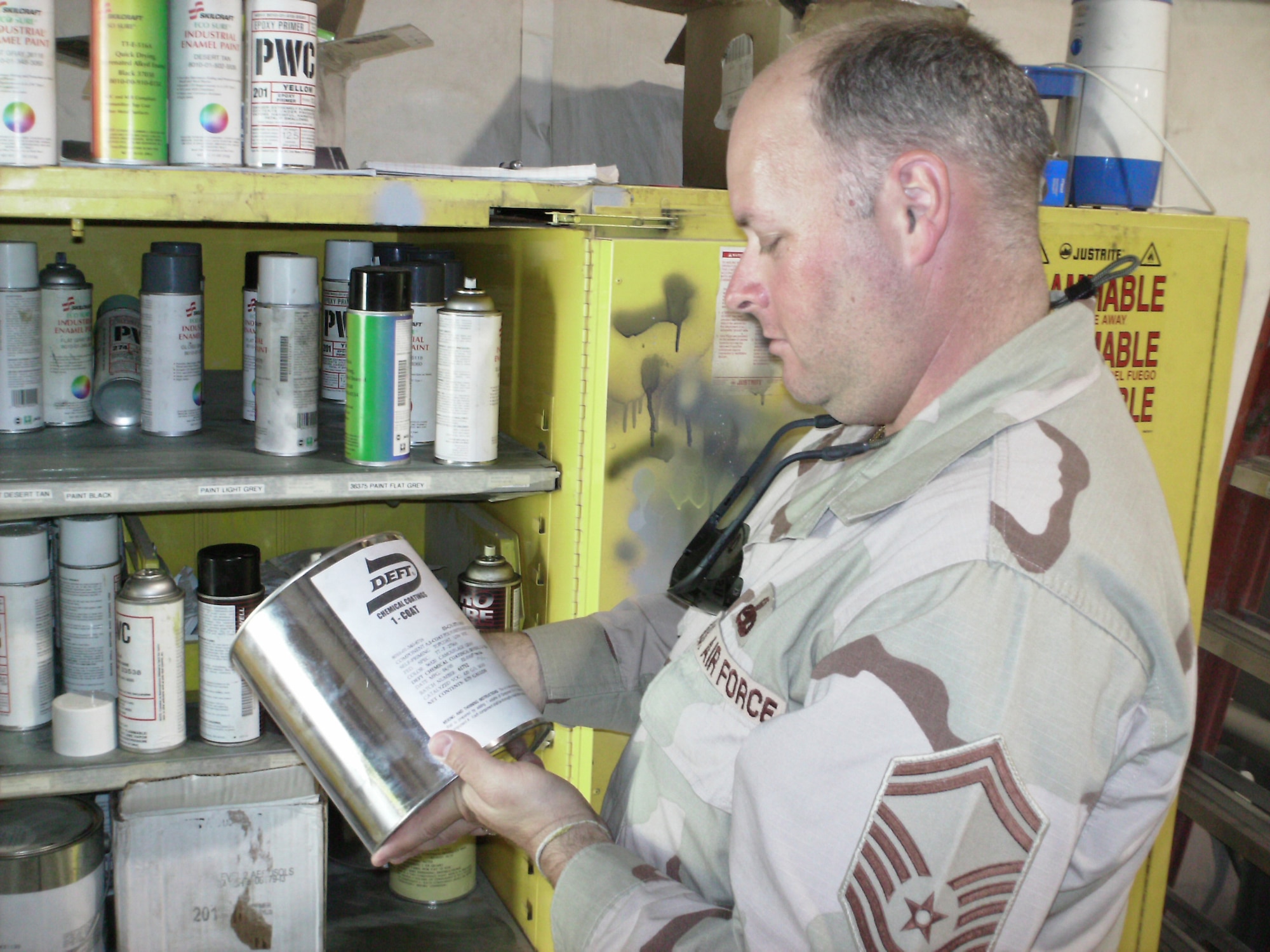 Senior Master Sgt. Ward evaluates corrosion prevention materials and paints used by Aircraft Structural Maintenance for maintenance painting operations. 