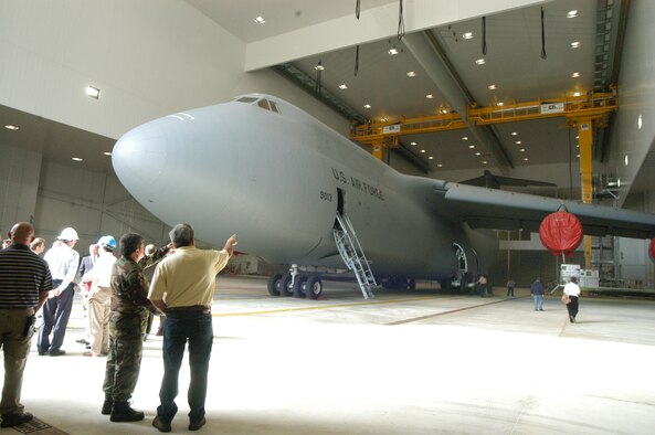 A C-5  sits in the new large aircraft corrosion control hangar Wednesday.The new facility is the largest construction project ever performed at Robins with 225,000 total square feet, in two 65,000 square foot hangar bays. It can hold a C-5 Galaxy, with 20 feet of working space around it. U. S. Air Force photo by Sue Sapp     