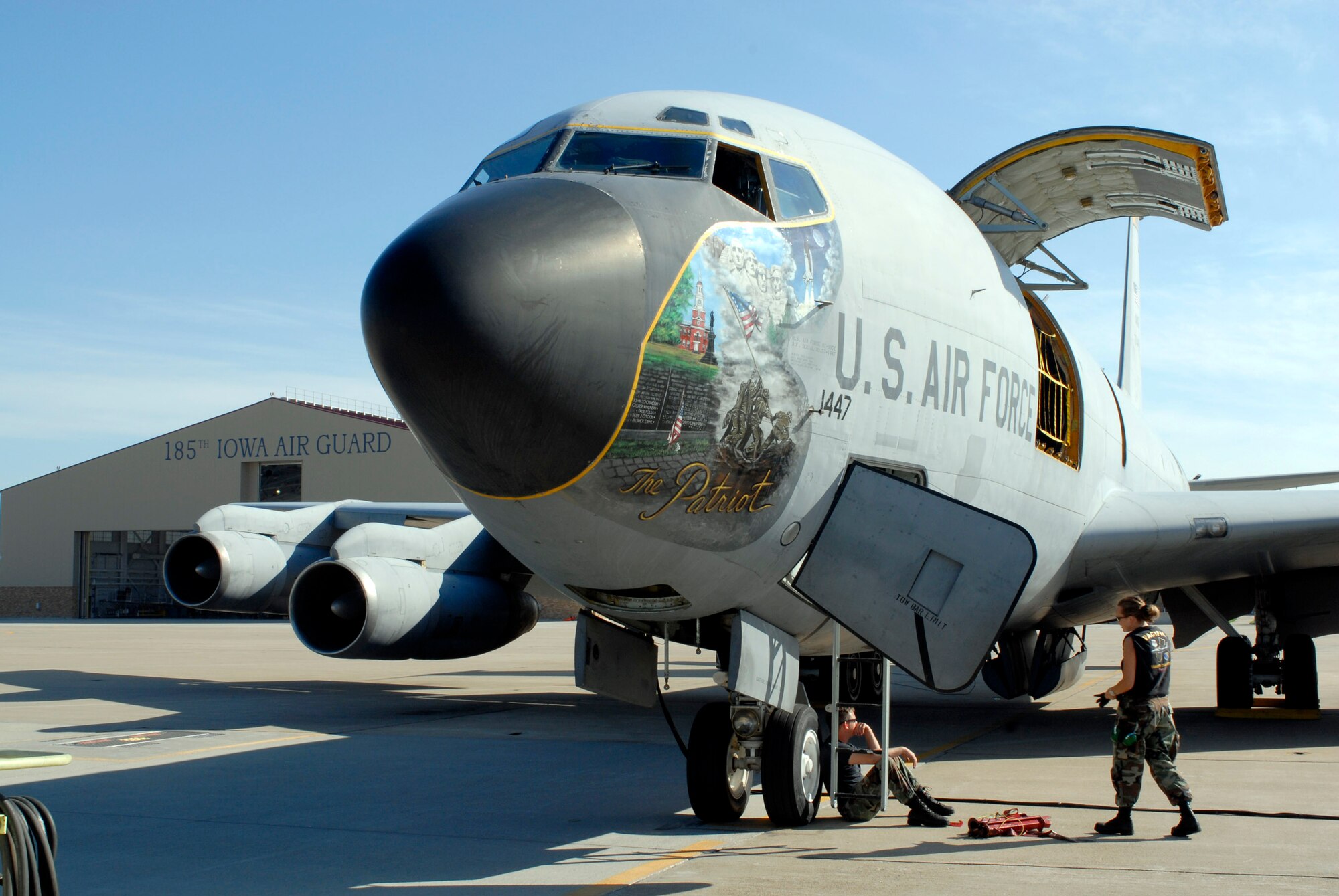 An Iowa Air National Guard's aging KC-135 Stratotanker, displaying patriotic nose art, is about to retire. The KC-135E assigned to the 185th Air Reserve Wing in Sioux City, Iowa, was flown out by a flight crew from Tinker Air Force Base, Okla., to Davis-Monthan AFB in Tucson, Ariz., where the aircraft will most likely be retired. The 185th ARW is on track to convert to the newer KC-135 R model this year. (U.S. Air Force photo/Master Sgt. Vincent De Groot)