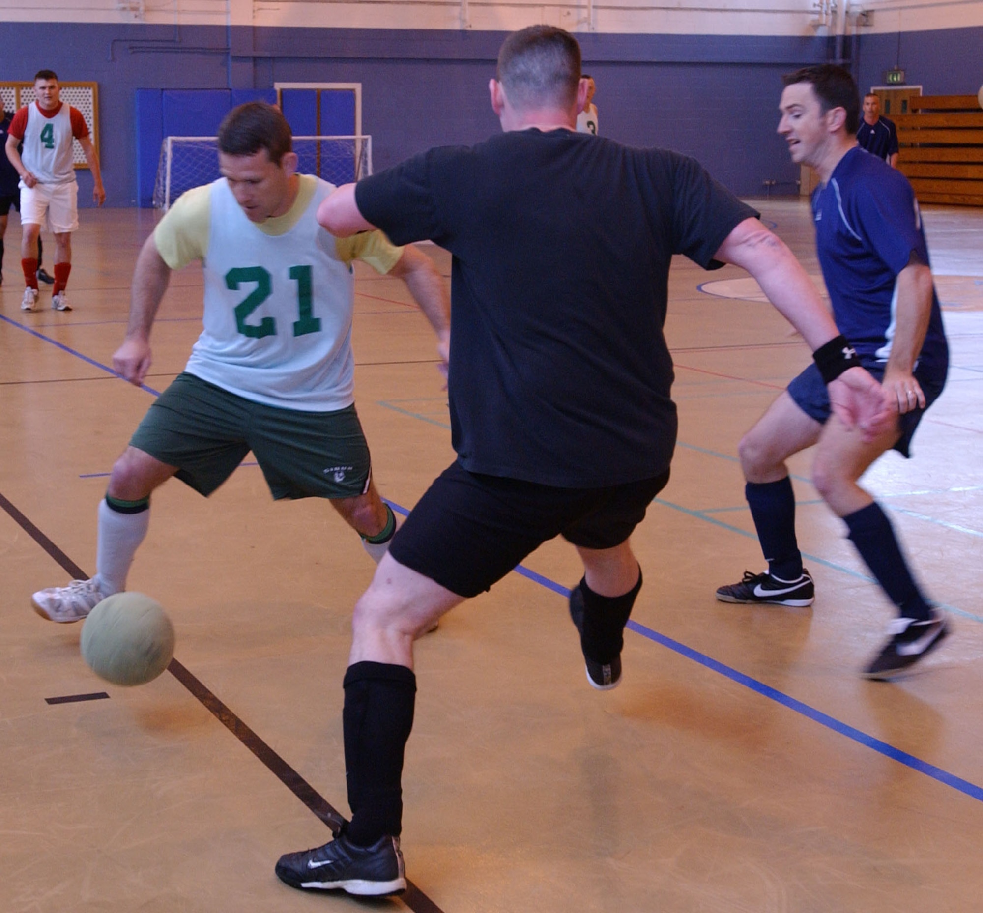 Michael Murphy (MVP) takes on Brad Masters, and Brian Bowers from 95th RS. ( U.S Air Force photo by Brad Smith)