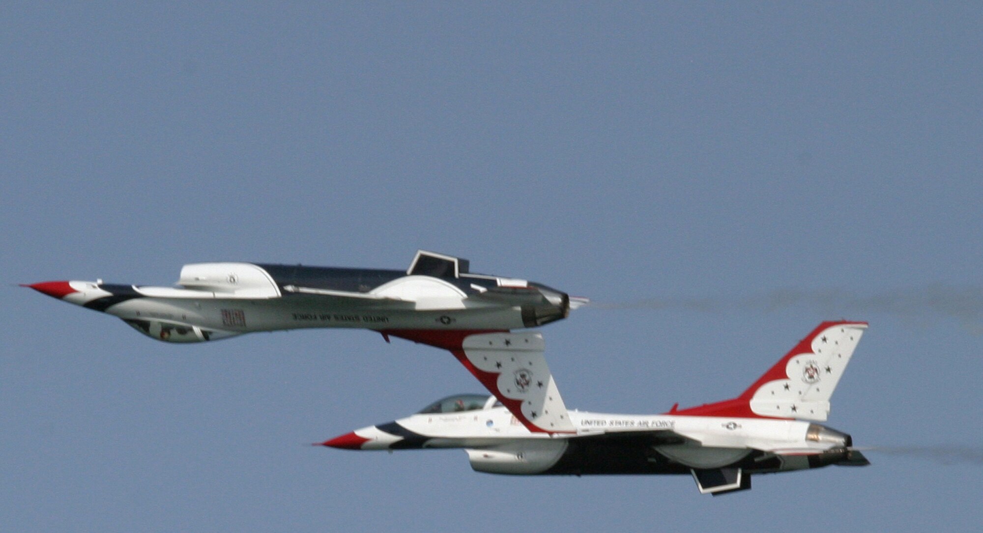 The U.S Air Force Air Demonstration Squadron, the Thunderbirds, fly above Ft. Lauderdale, Fla., during the 2007 McDonald’s Air and Sea Show on May 6.  The Thunderbirds perform precision aerial maneuvers demonstrating the capabilities of Air Force high performance aircraft to people throughout the world.  The squadron exhibits the professional qualities the Air Force develops in the people who fly, maintain and support these aircraft.  The Thunderbirds were officially activated June 1, 1953, as the 3600th Air Demonstration Team at Luke Air Force Base, Ariz., flying the F-84G Thunderjet.  The team has converted to many different aircraft over the years, most recently converting to the F-16 Fighting Falcon in 1983. (U.S. Air Force photo/Tech. Sgt. Paul Dean)