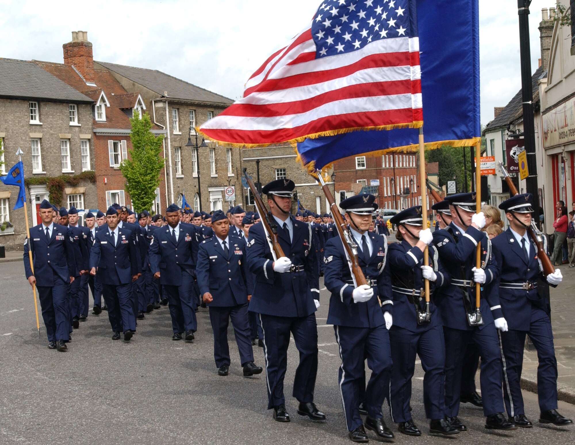 Airmen from RAFs Mildenhall and Lakenheath march in the Bury St. Edmunds America 400 parade May 6, 2007. (U.S Air Force photo by Airman Brad Smith)  