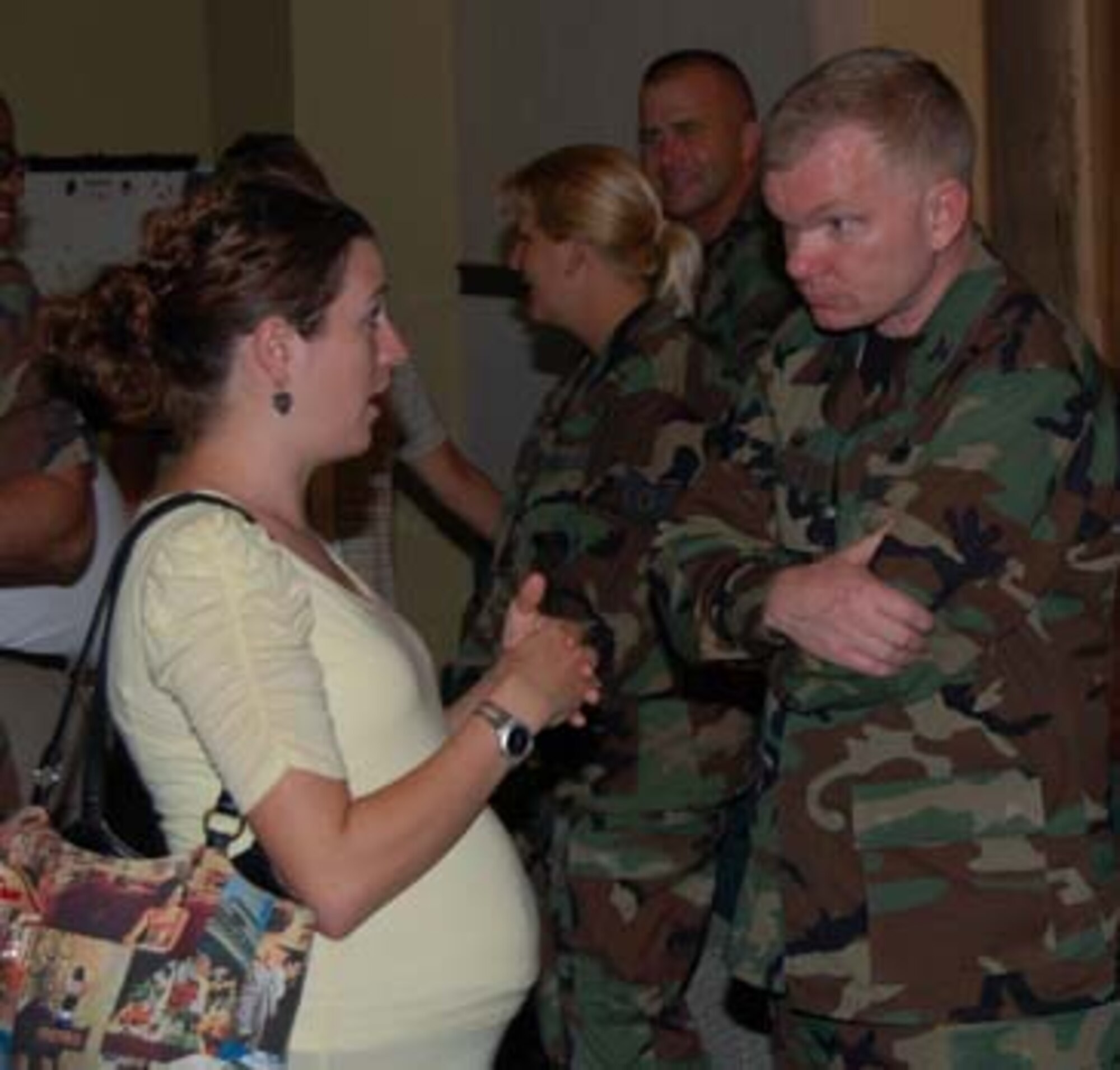 Staff Sgt. Ben Martinez, from the 36th Communications Squadron, locates his house to see if it is affected by radon at the Town Hall meeting Tuesday at the base theater. 