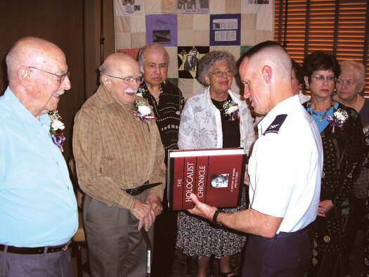 Desert Dove Chapel sponsored a Holocaust Remembrance Ceremony honoring the survivors. D-M Airmen attended and escorted survivors honoring them at a luncheon at the Davis-Monthan Mirage Officers club. (DLN photo/Diane M. Kephart)
