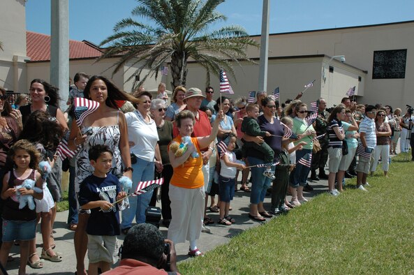 Family members of Air Force Reserve Combat Search and Rescue Airmen anxiously await their return after a deployment to Afghanistan for various lengths of time.  pararescuemen, combat rescue officers, HH-60G Pave Hawk aircrew members and maintainers and various support personell were part of the Rescue force providing combat search and rescue.