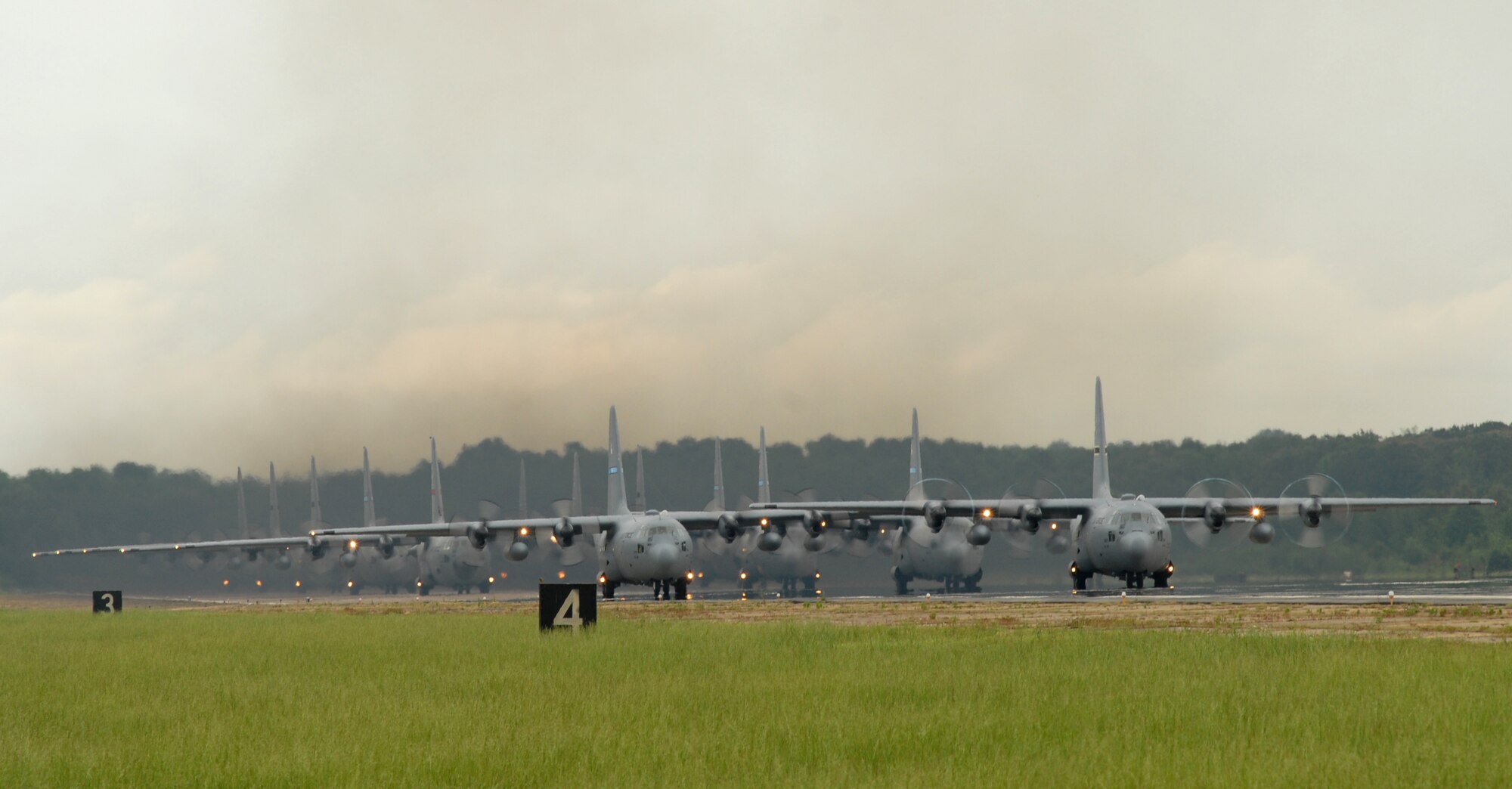 Little Rock Air Force Base C-130's taxi the flight line during an exercise May 11, 2007. Fourteen C-130's participated as part of the Air Force Weapons School syllabus for C-130 and C-17 Weapons Instructor Courses. (U.S. Air Force photo by Airman First Class Christine A Clark)