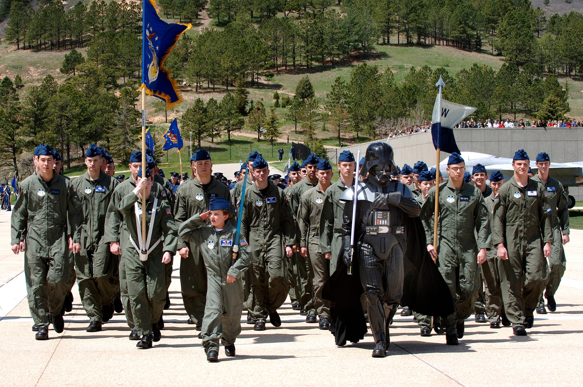 Ten-year-old Julian Willis and a special visitor lead Cadet Squadron 39 during a formation at the U.S. Air Force Academy, Colo.  The Make-a-Wish Foundation and the Air Force Academy made Julian a "Cadet for a Day".  Cadets donate money for the program and have sponsored 22 children since the program started in 2000. (U.S. Air Force photo/Mike Kaplan)