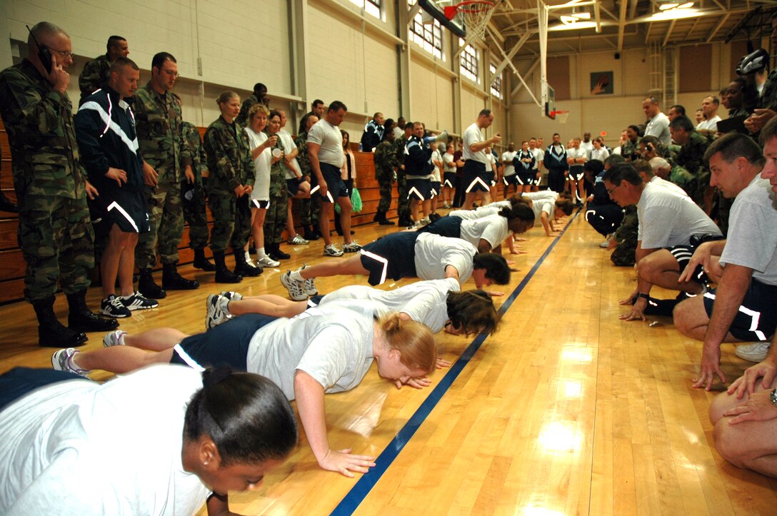 Members of the 315th Airlift Wing, Charleston Air Force Base, S.C., participate in the first ever commander's push-up challenge. (photo by Senior Airman Dani Pacheco, USAFR)