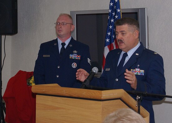 482nd Fighter Wing Chaplain, Lt. Col. William Chambers, flanked by Sergeant Ayers, speaks to attendees at the National Day of Prayer breakfast here May 3. Sergeant Ayers has been the lead planner and coordinator the last three years for the event. Air Force Reserve Command recently recognized him as the 2006 Citizen Airman Outstanding Reserve Chaplain Assistant of the Year. (U.S. Air Force photo/Dan Galindo)